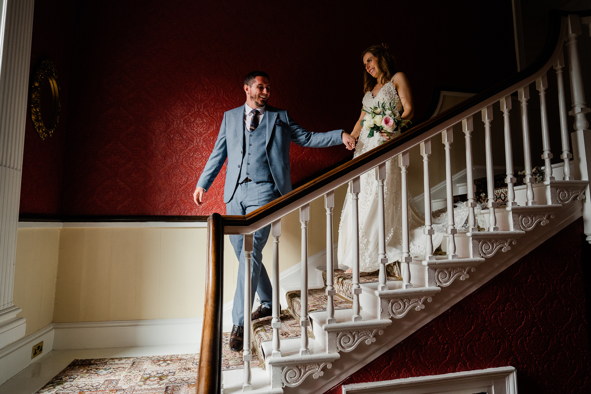 A man and woman on a staircase