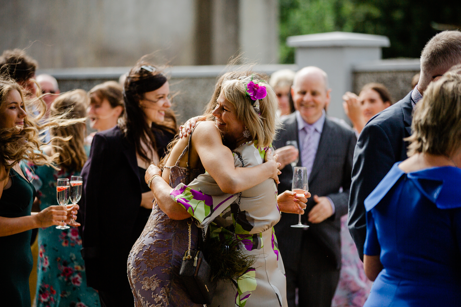 A woman kissing another woman