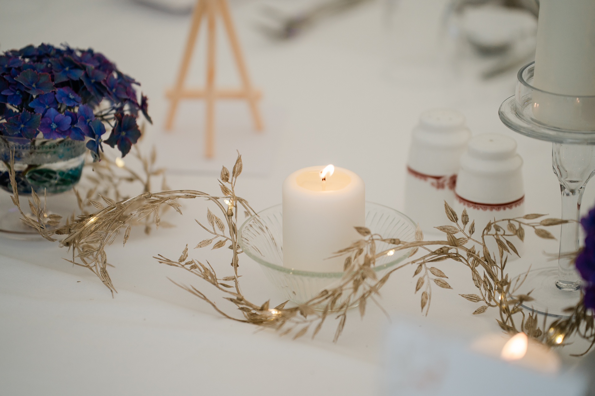 A candle on a table