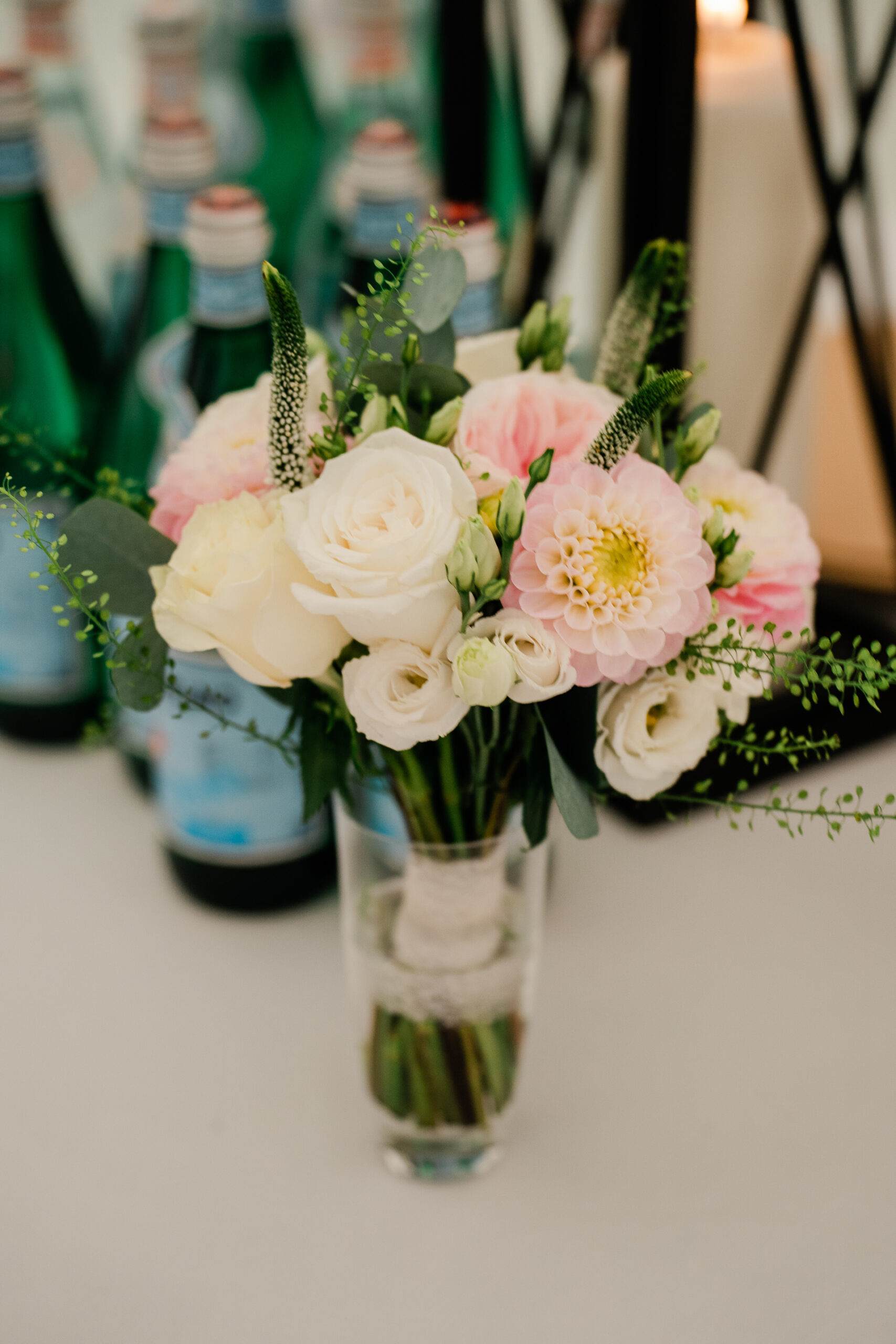 A vase of white and pink flowers