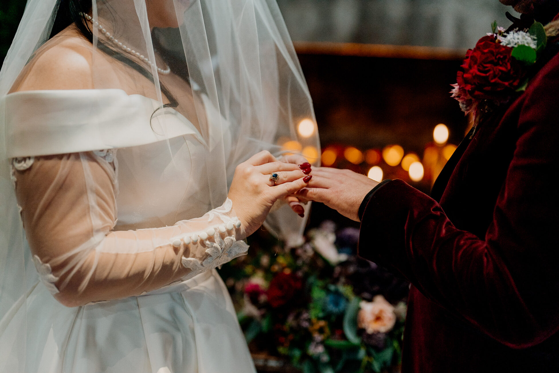 A woman in a white dress and a man in a tuxedo