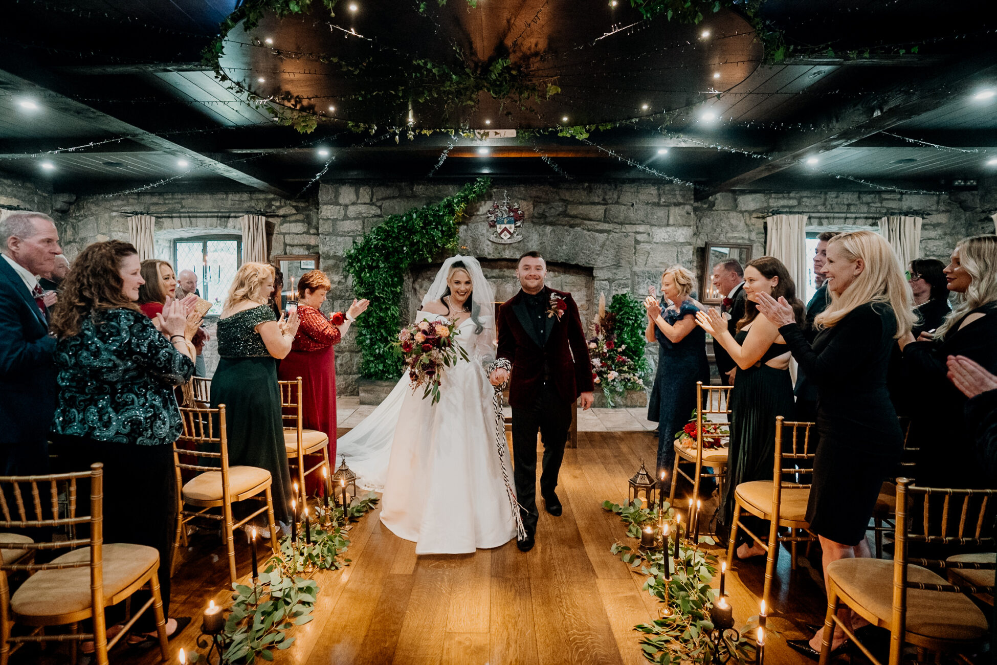 A bride and groom walking down the aisle