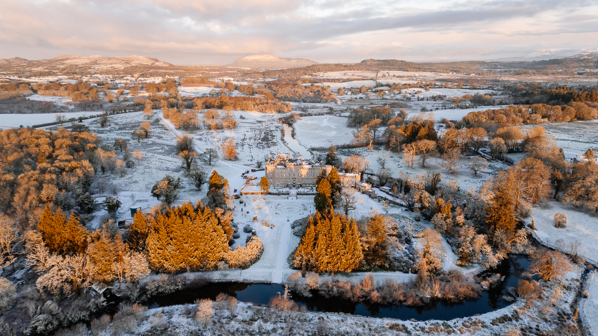 A landscape with trees and snow