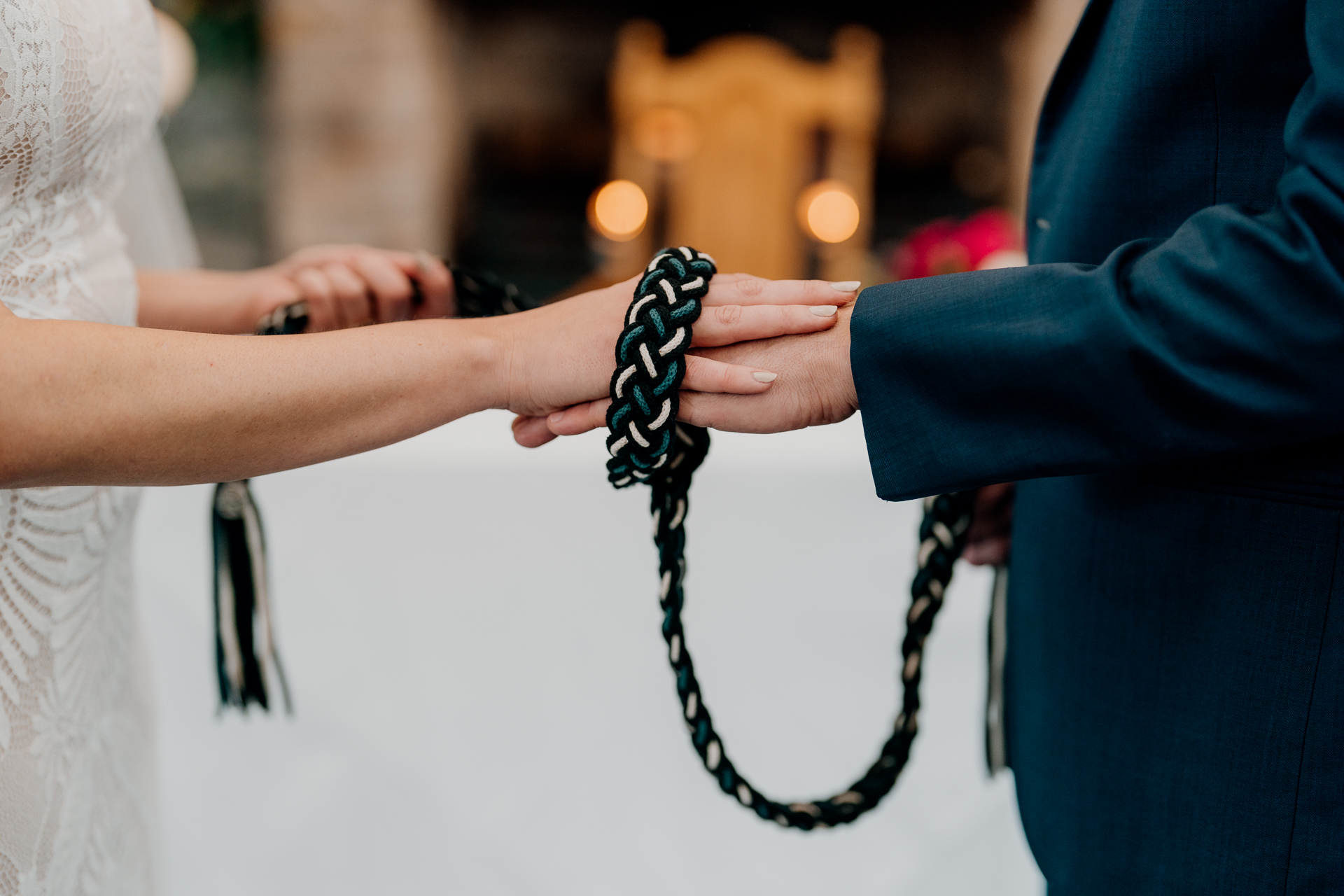 A couple of people holding a ring