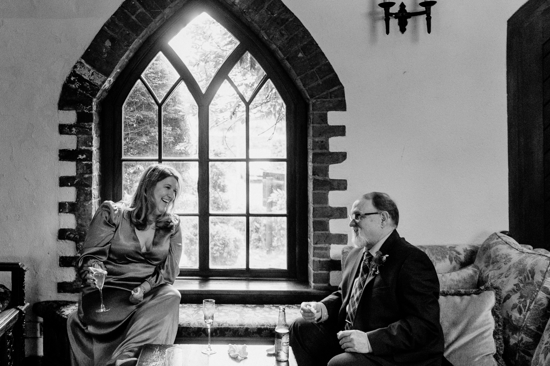 A man and a woman sitting on a couch