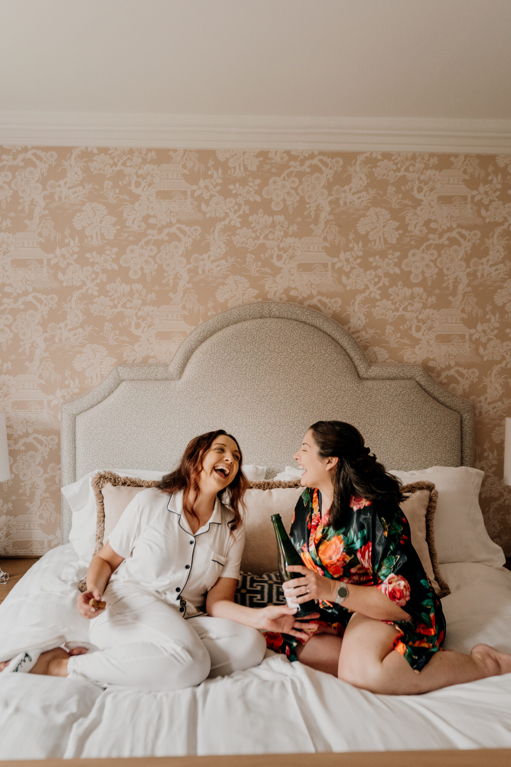 Two women sitting on a couch