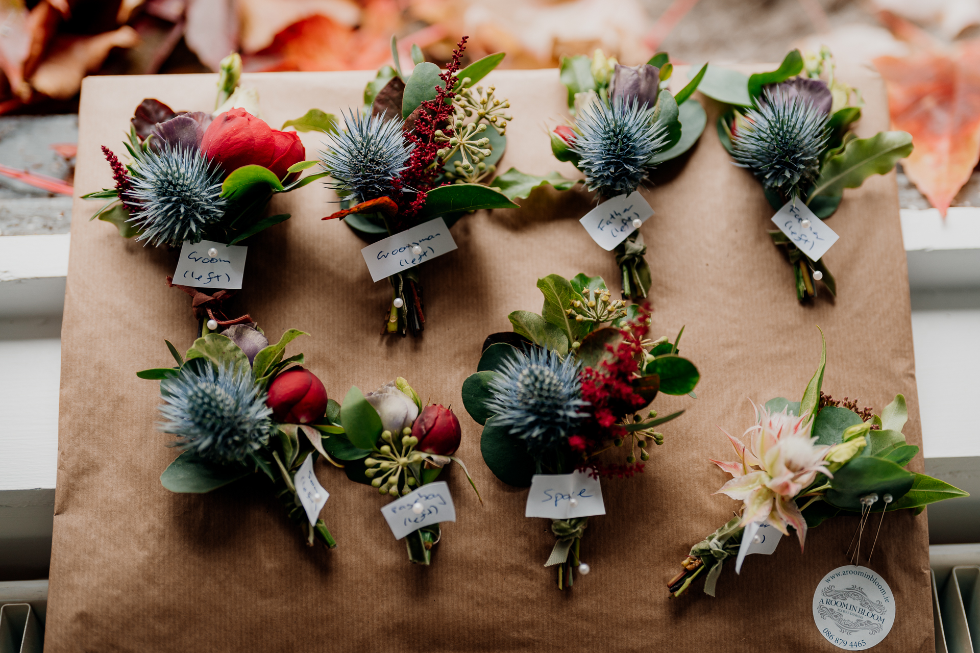 A table with flowers and cards on it