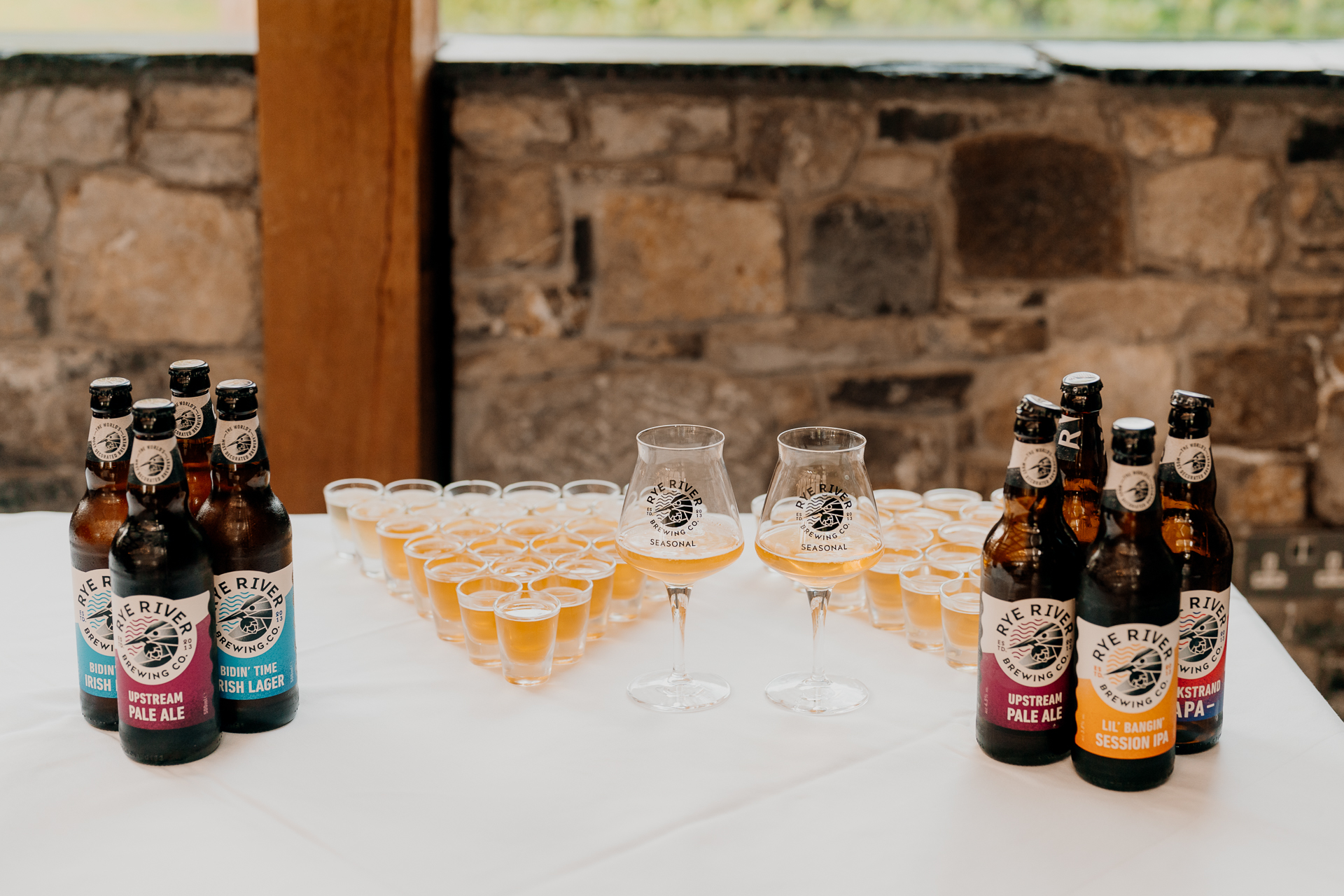 A table with bottles and glasses