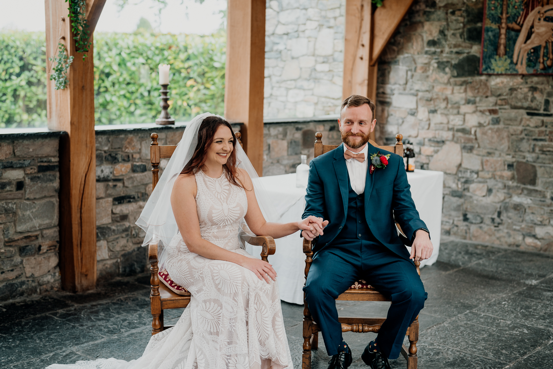 A man and woman sitting on a bench