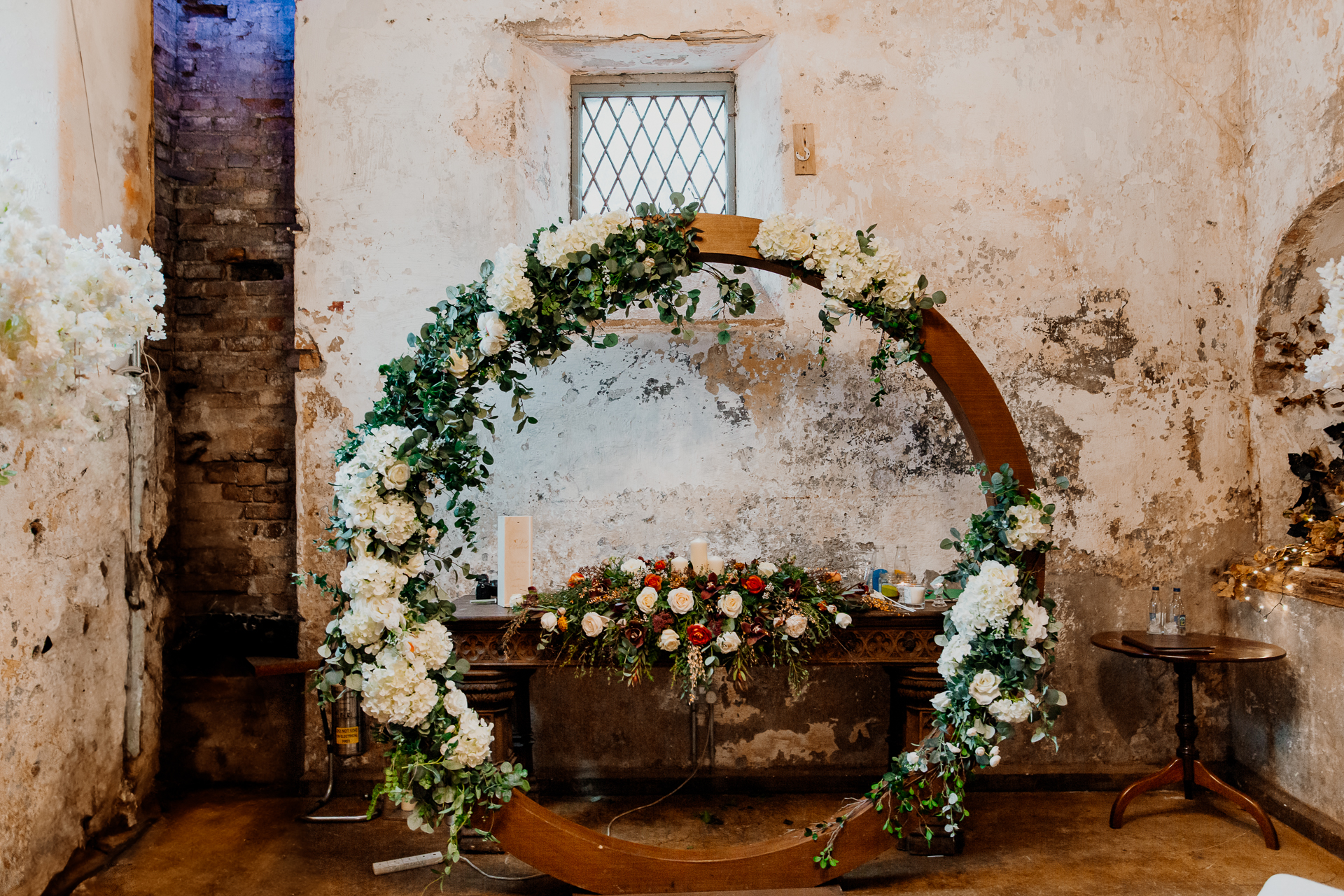 A fireplace with flowers