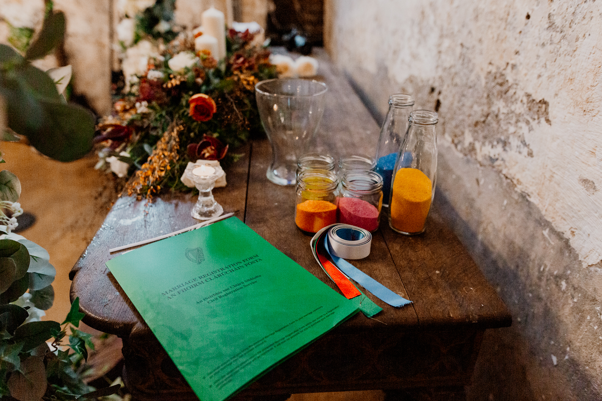 A table with a book and glasses on it