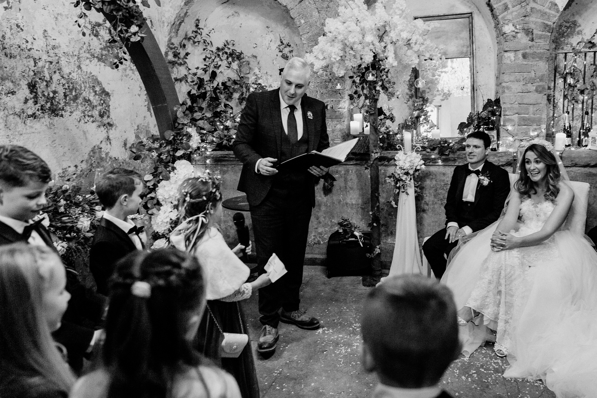 A bride and groom walking down the aisle