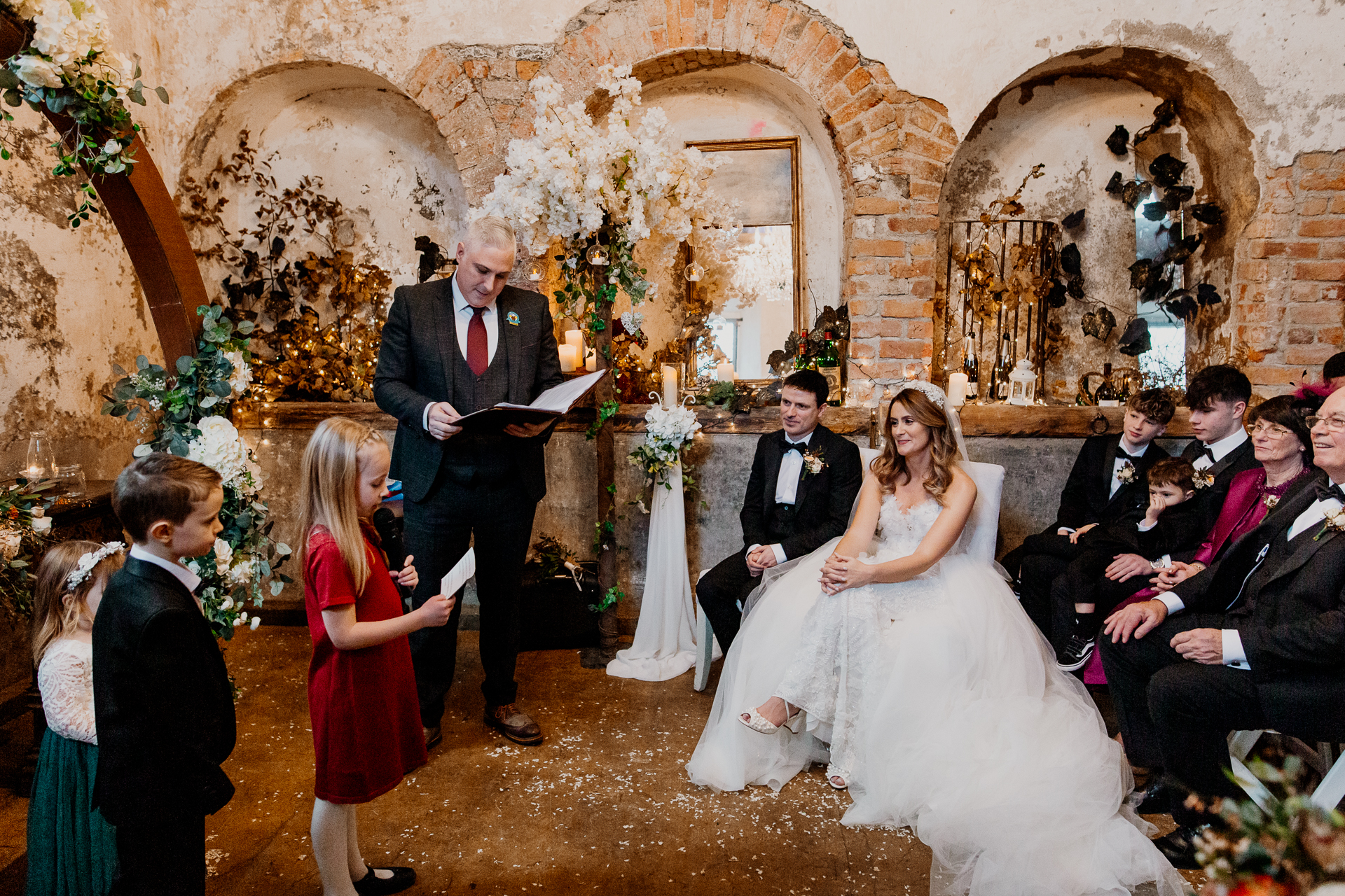 A bride and groom walking down the aisle