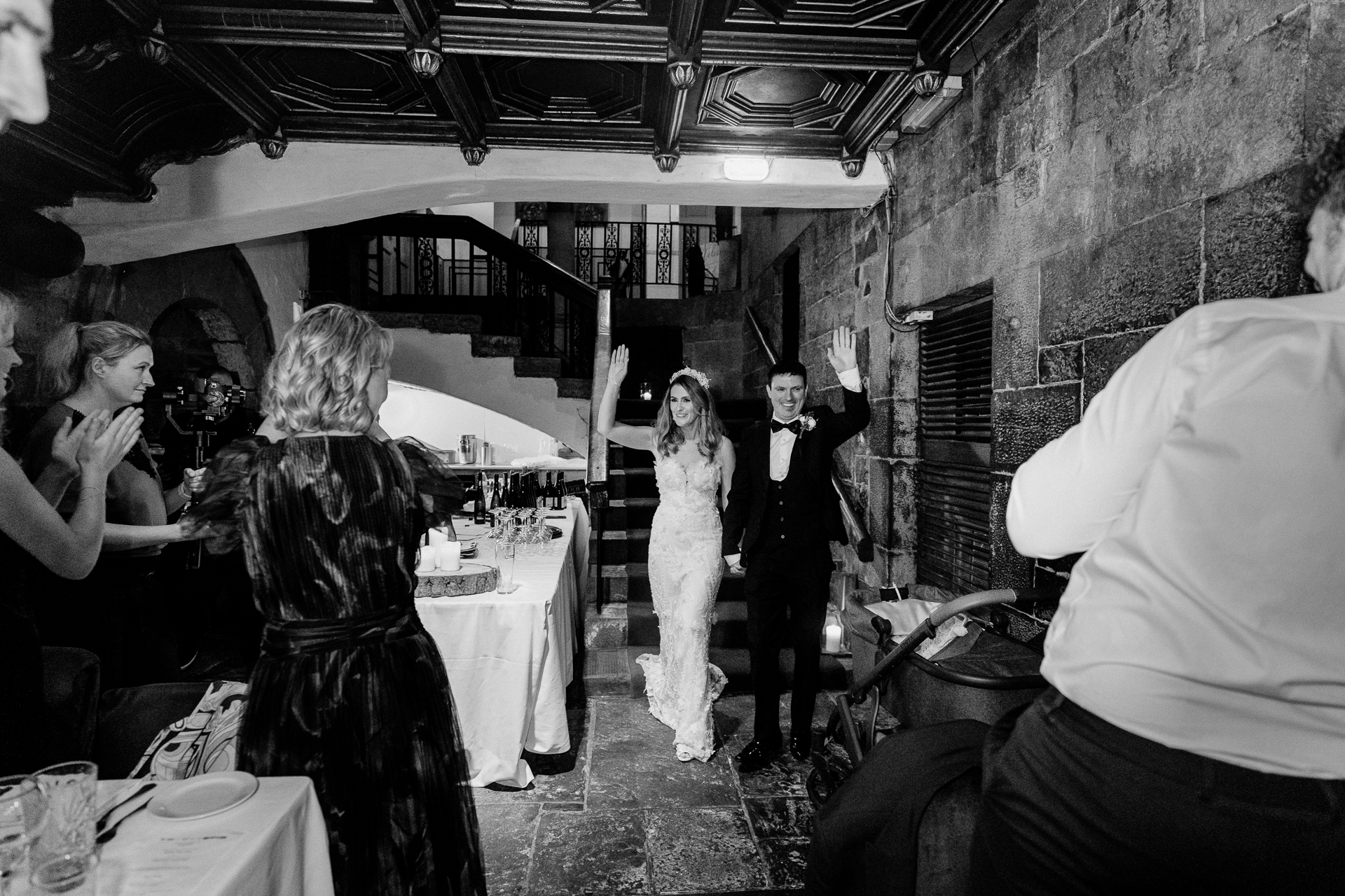 A bride and groom dancing at a wedding reception