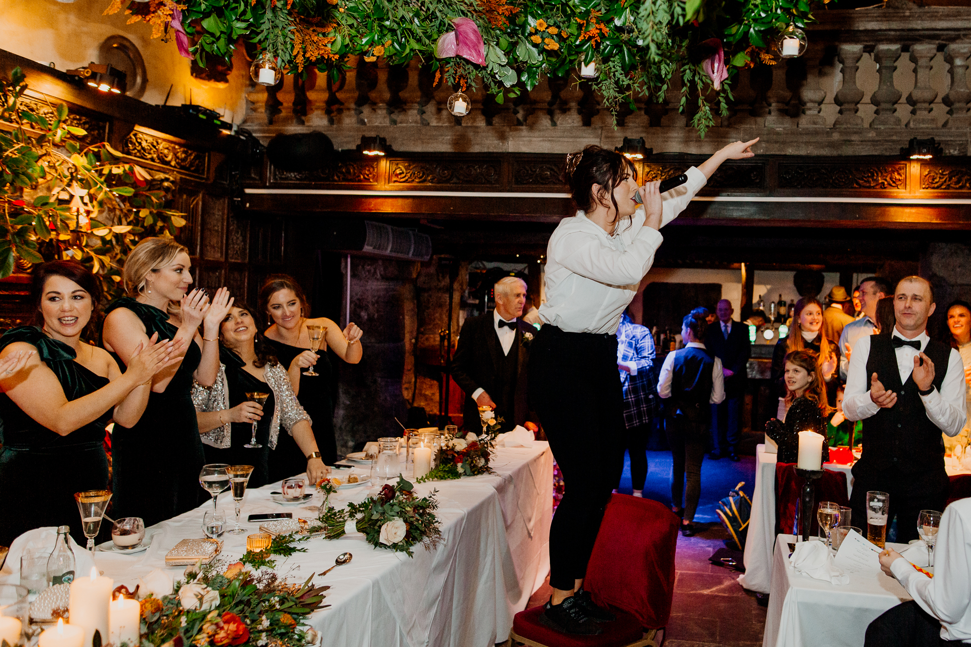 A man and woman dancing at a wedding reception