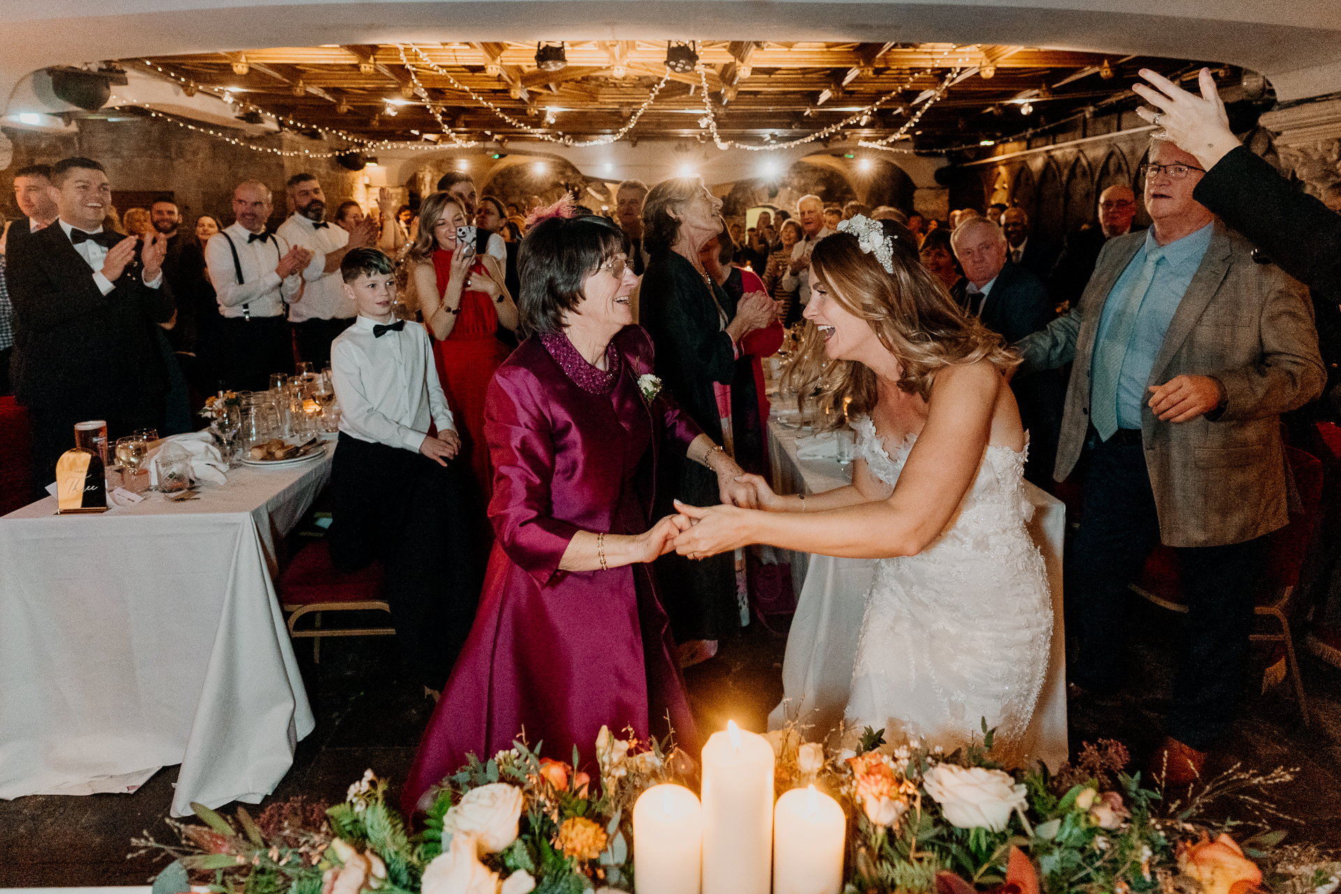 A man and woman dancing at a wedding reception