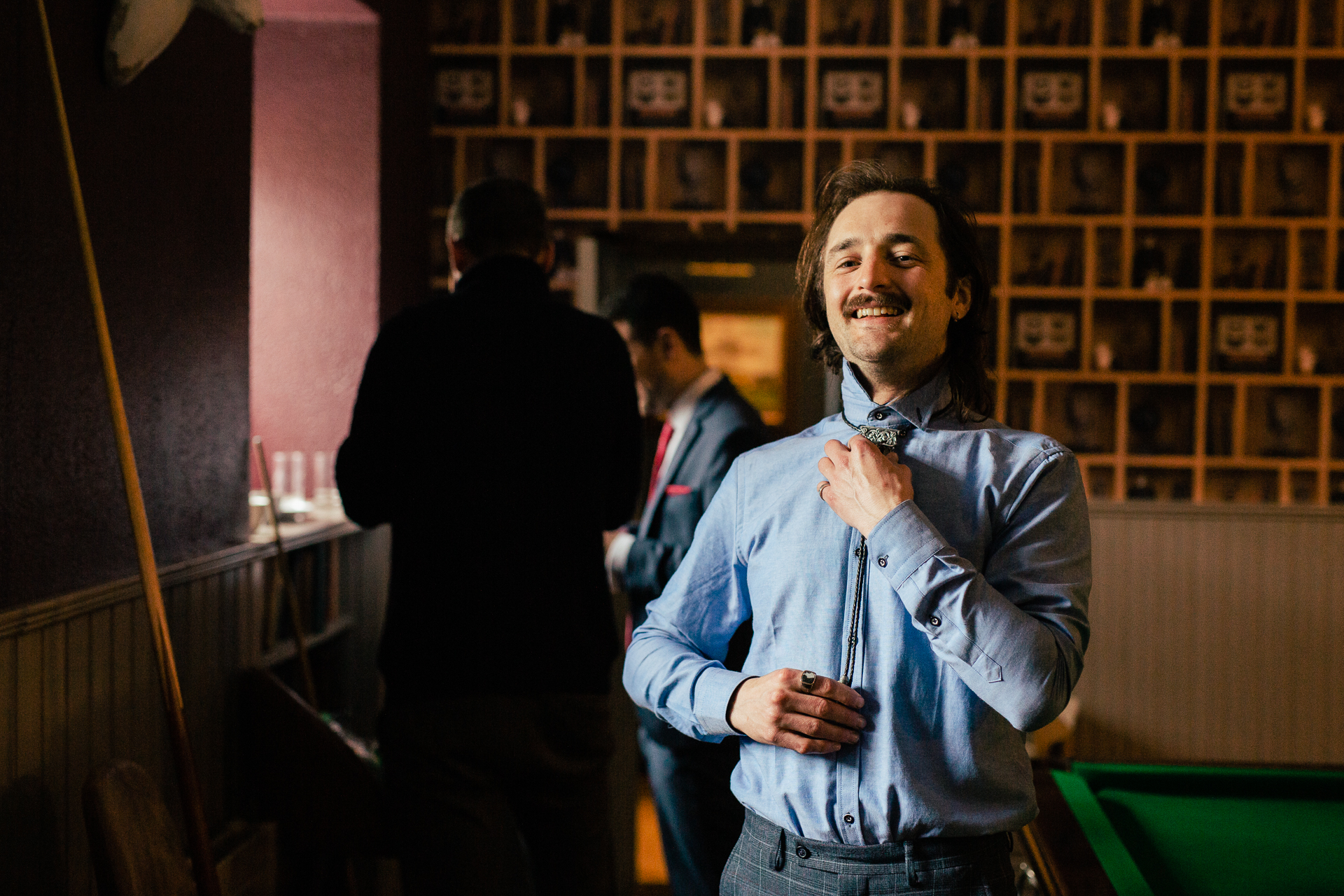 A man holding a drink