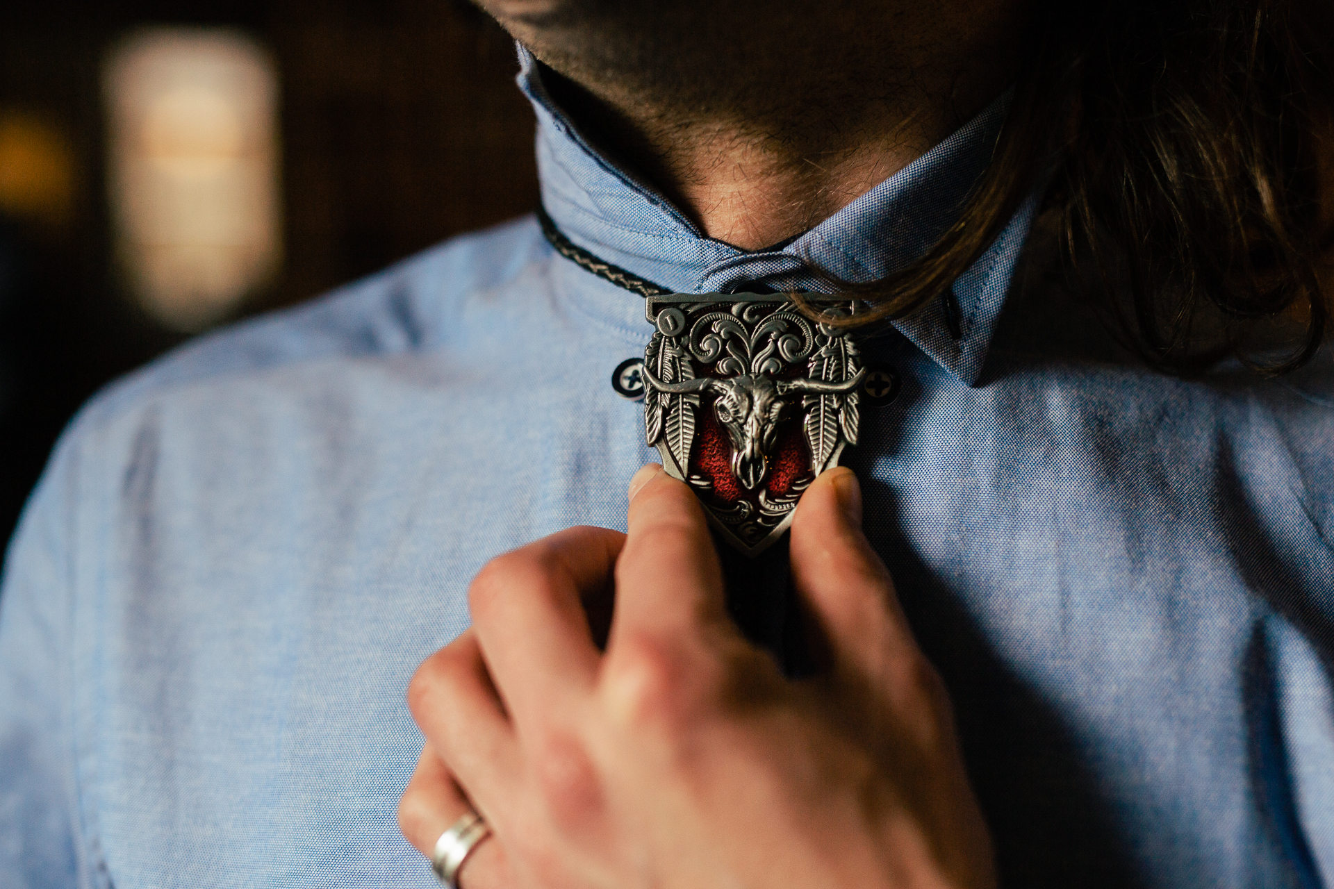 A man wearing a necklace