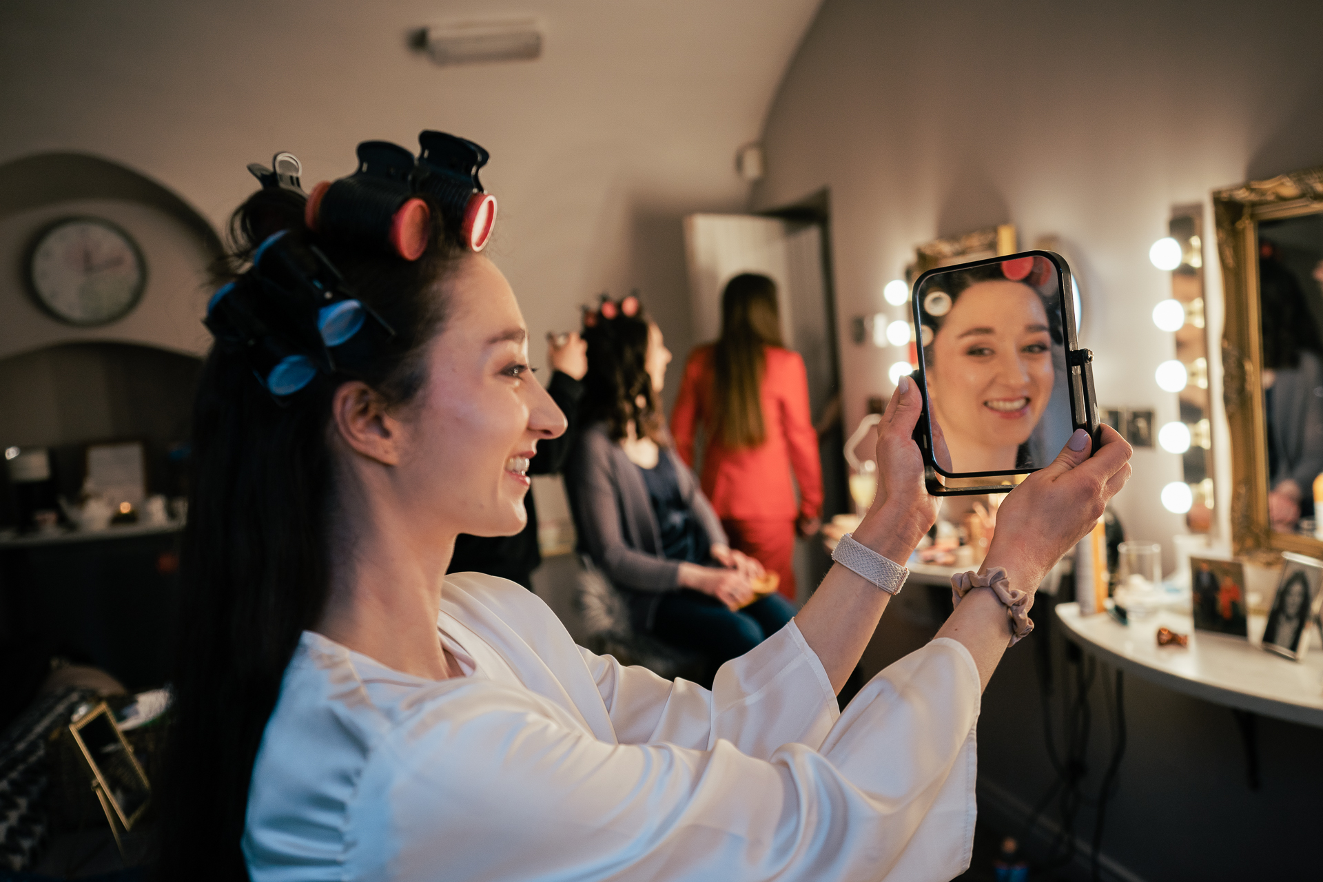 A person holding a mirror