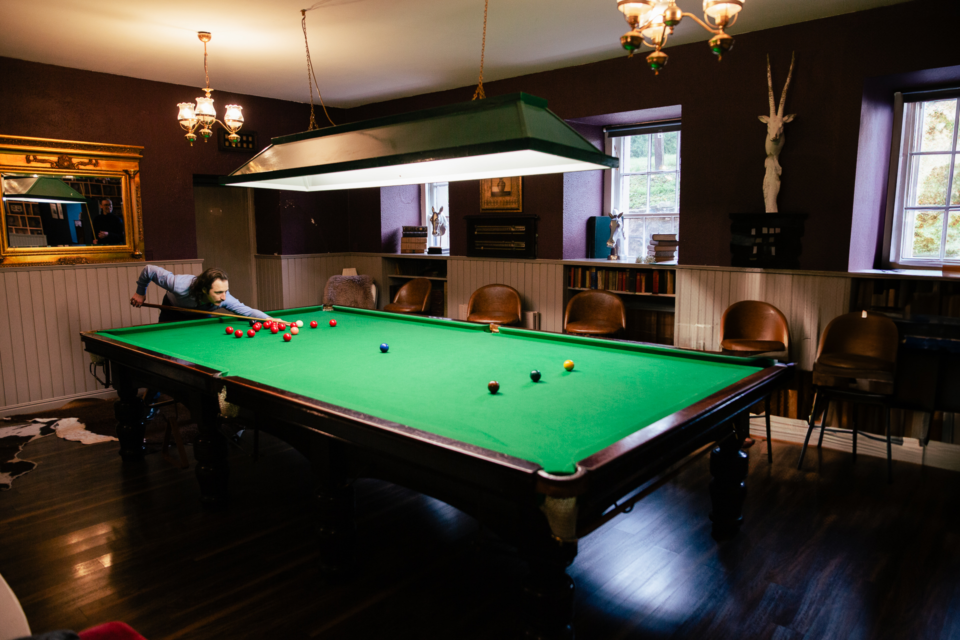 A pool table in a room