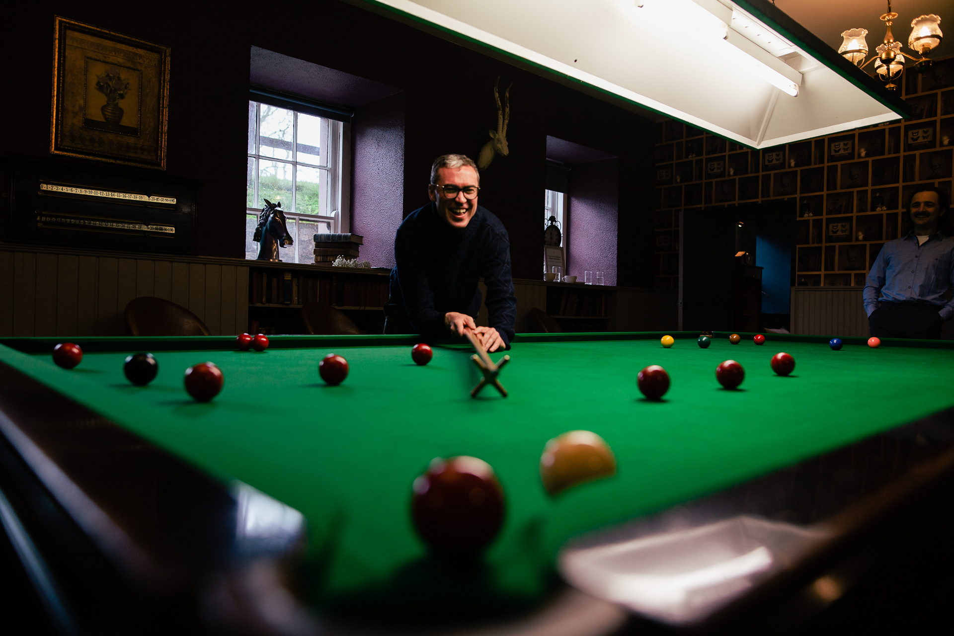 A person playing pool