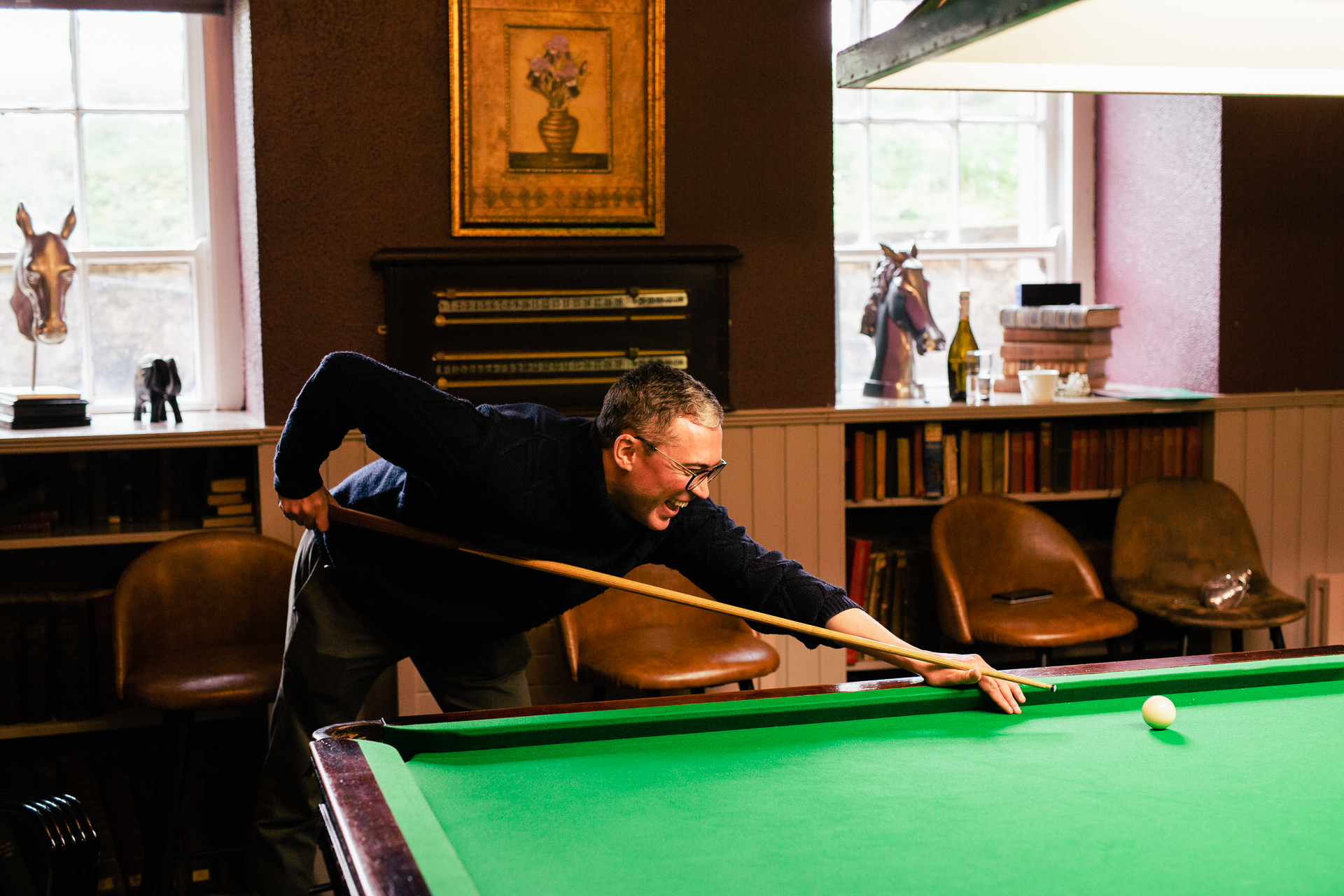 A person playing pool