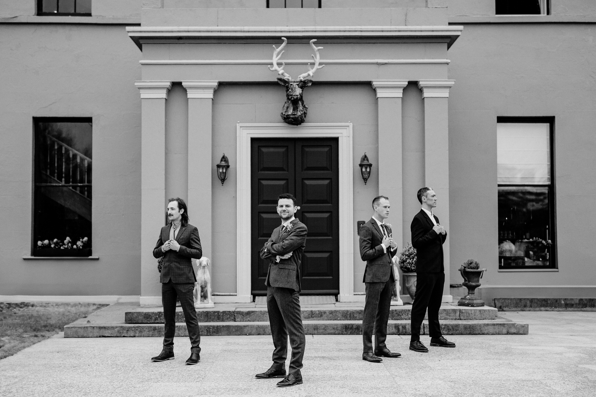 A group of people standing in front of a building