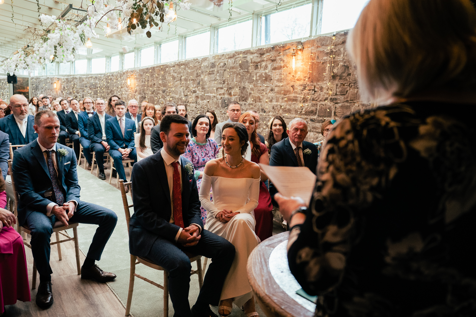 A group of people sitting in chairs