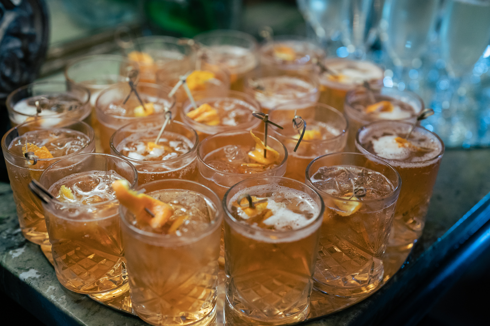 A group of glasses with liquid in them