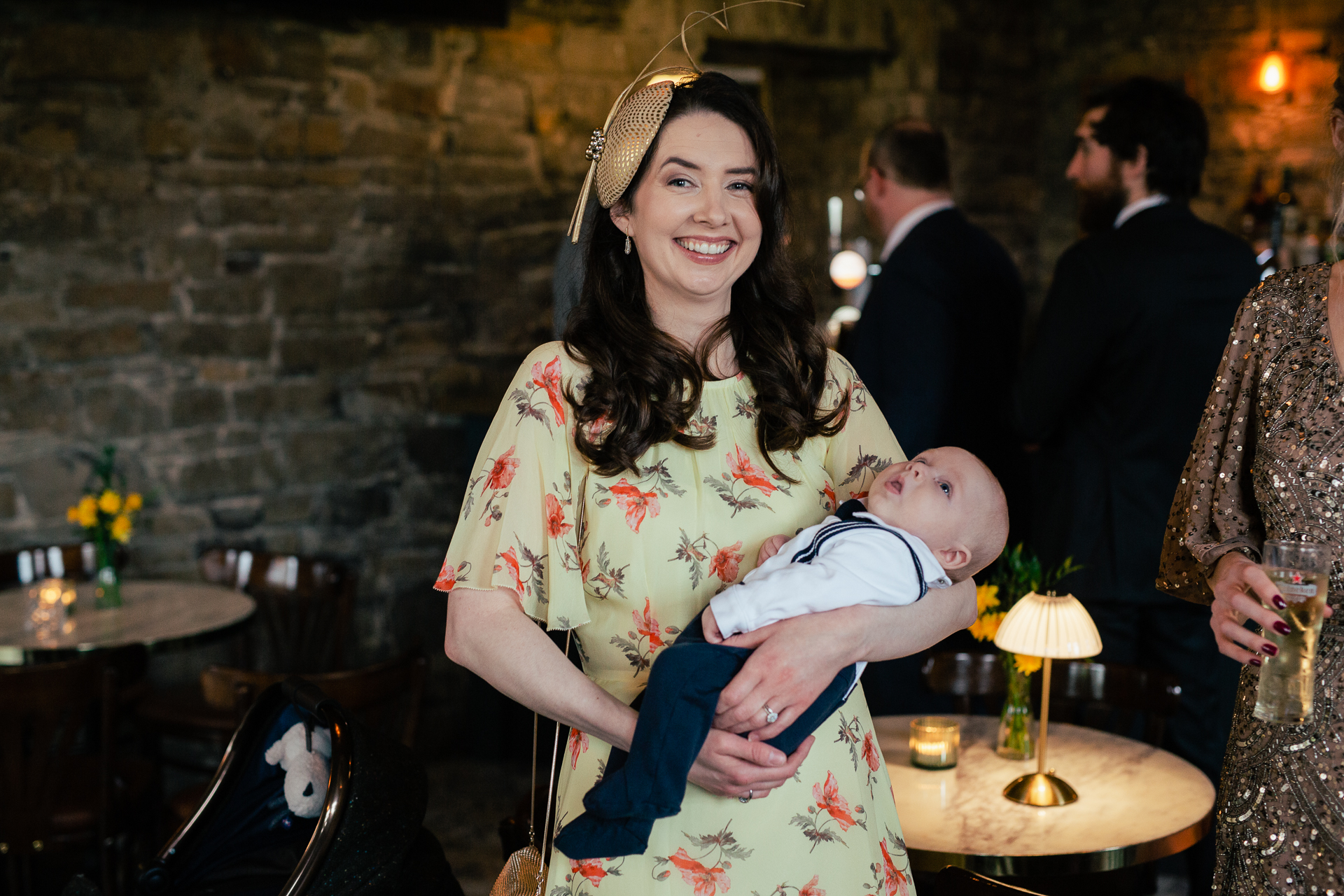 A woman holding a baby