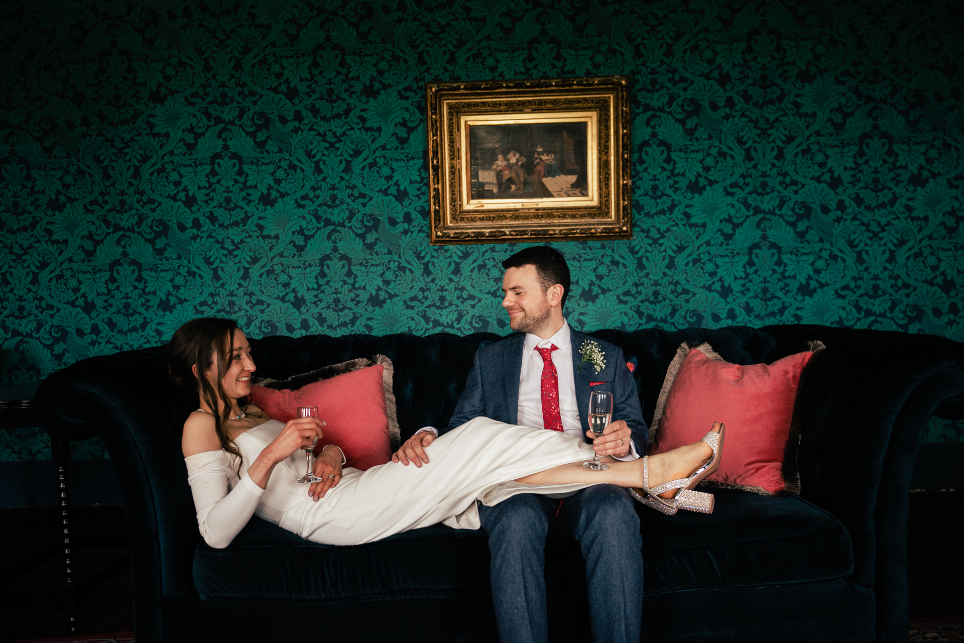 A man and woman sitting on a couch