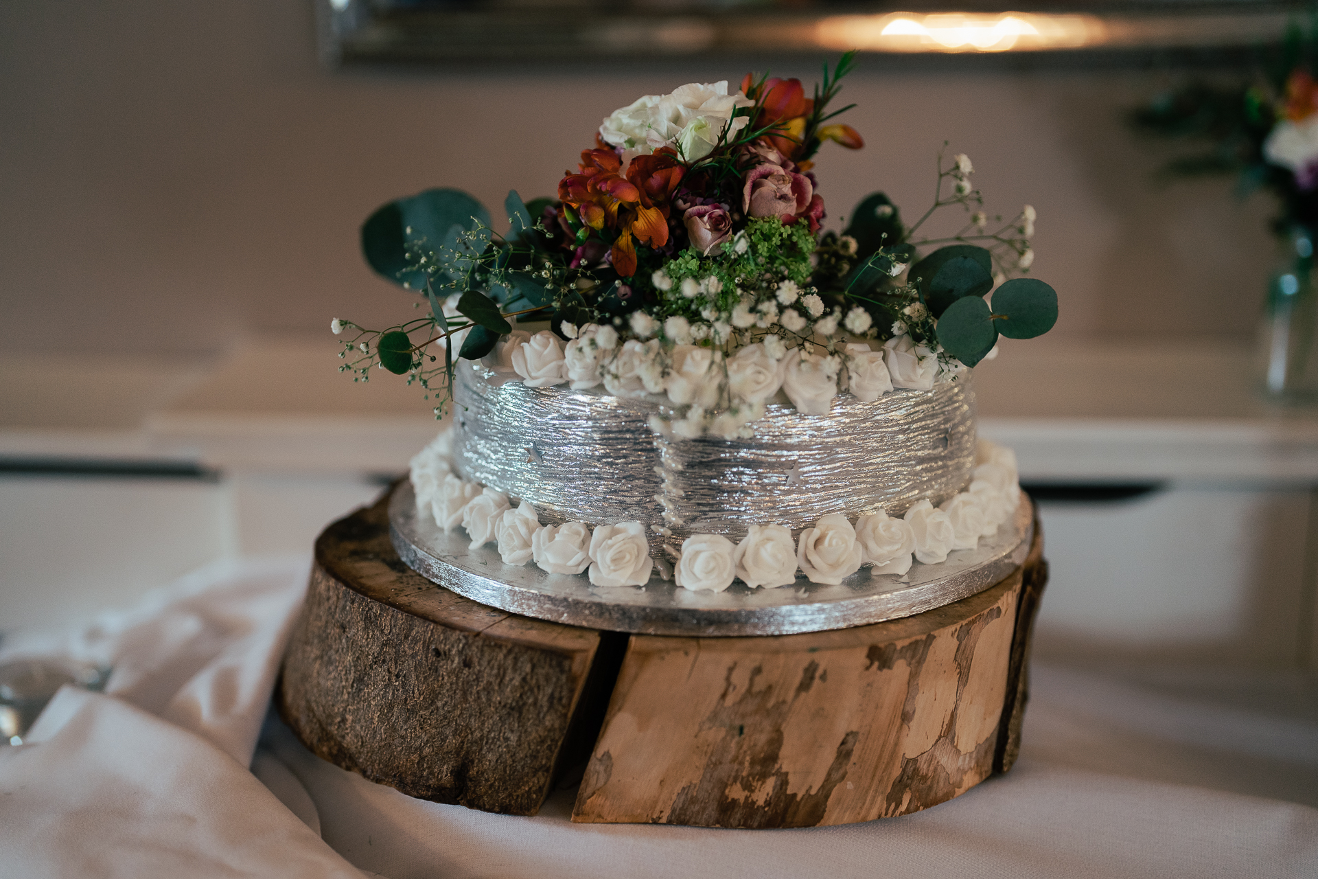 A cake with flowers on top