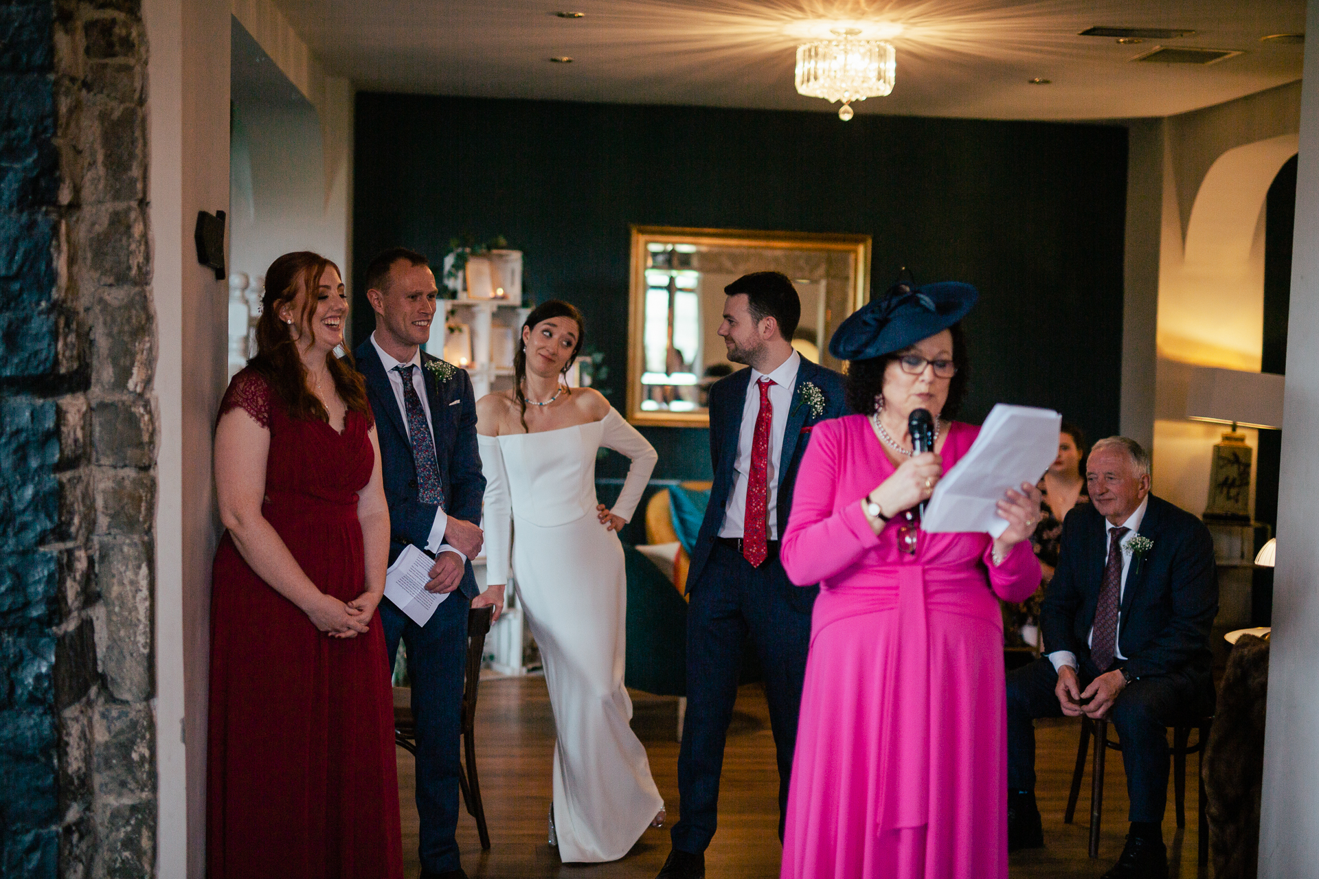 A group of people standing in a room