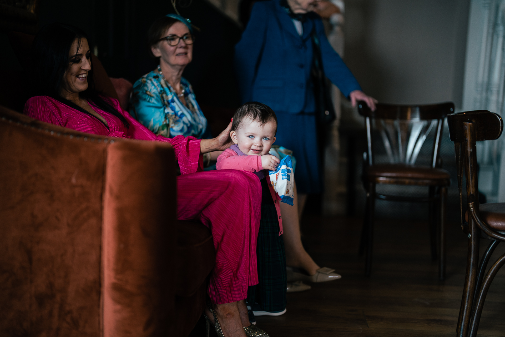 A group of people sitting in chairs