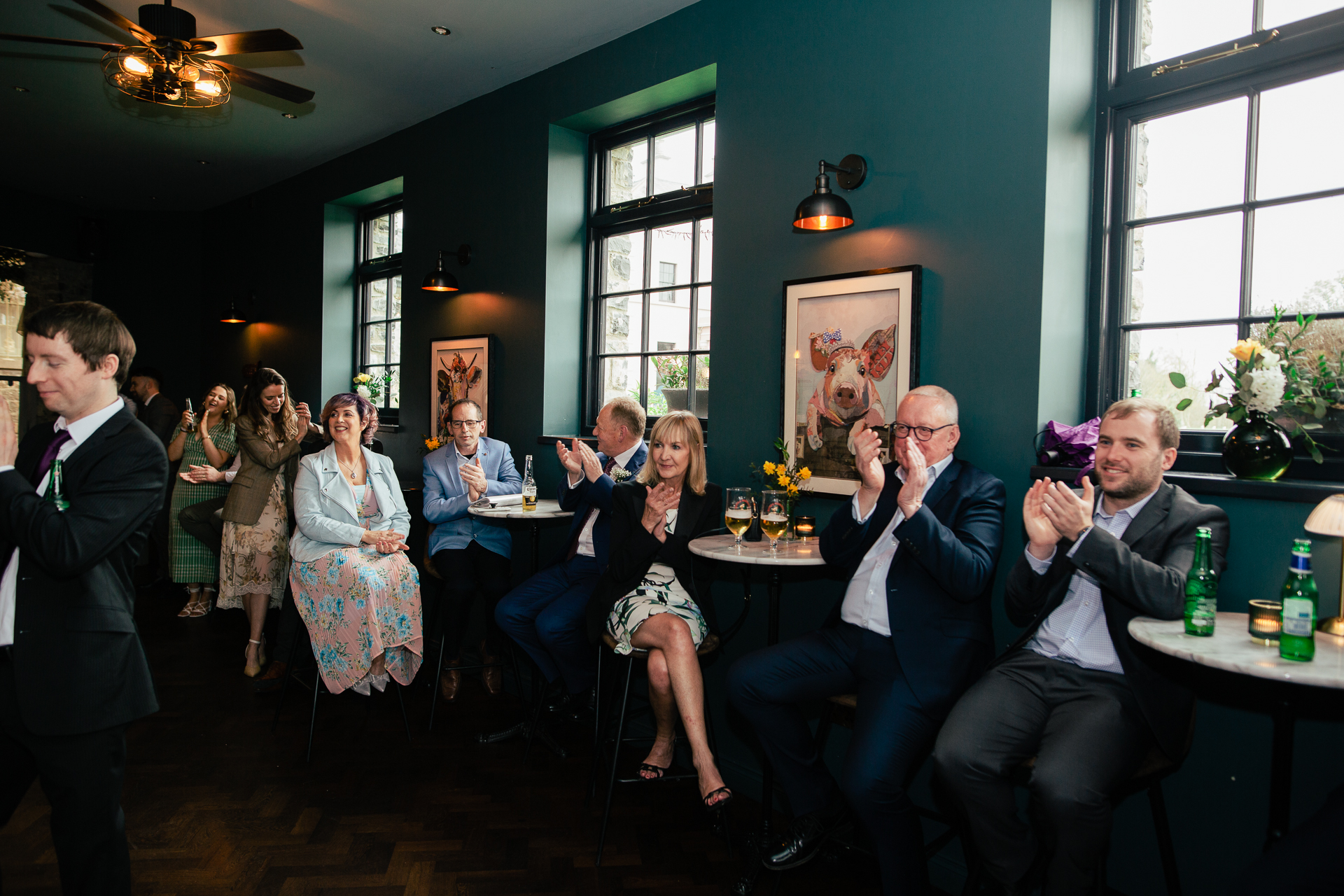 A group of people sitting in a room