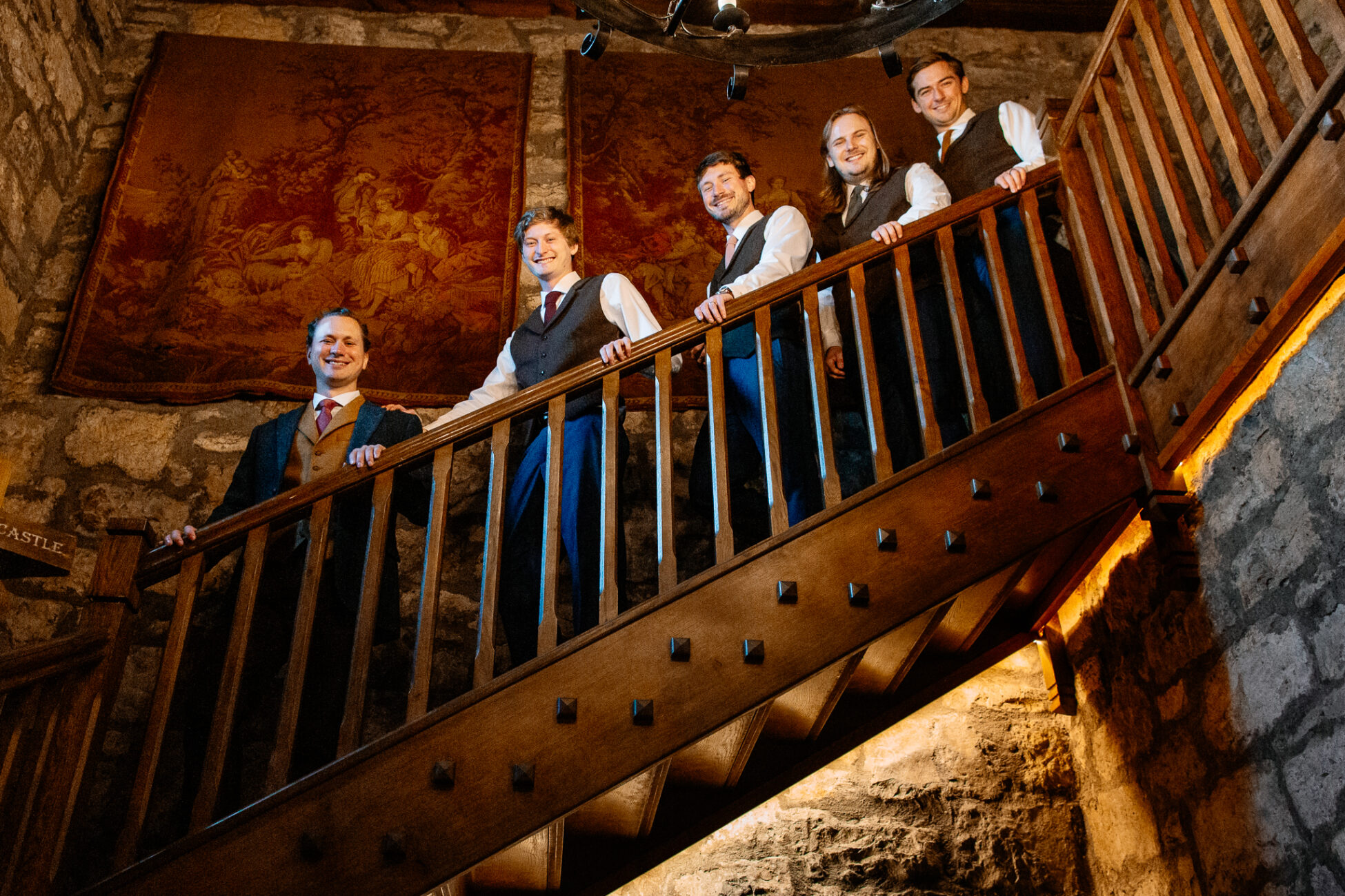 A group of people on a wooden staircase