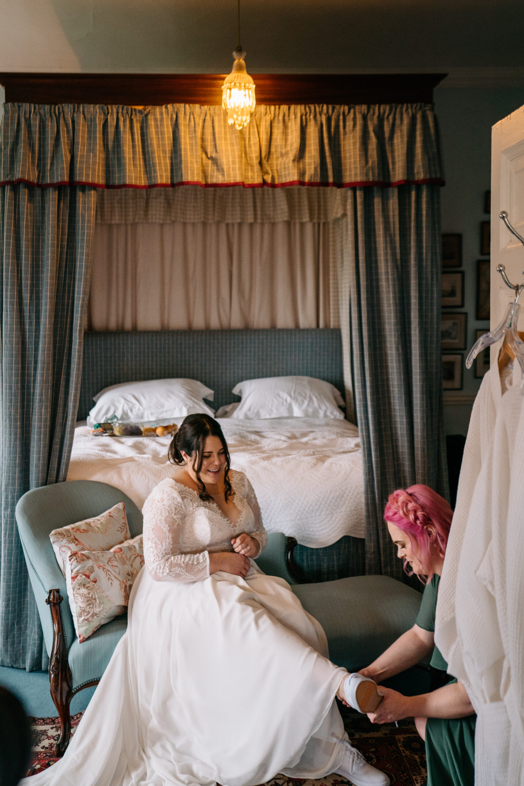 The bride preparing for her big day in the elegant bridal suite of Glin Castle, surrounded by timeless decor and natural light.