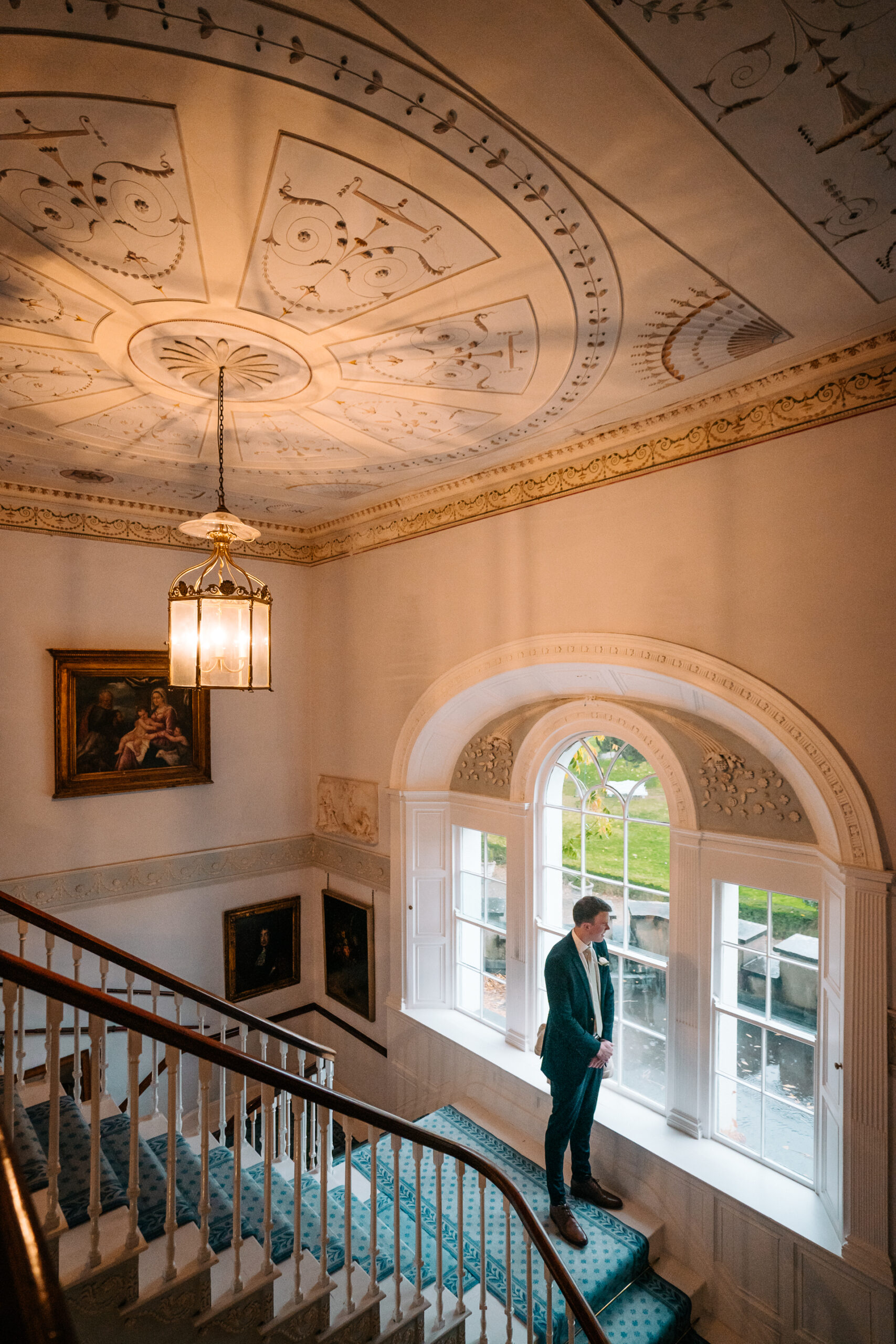 The bride preparing for her big day in the elegant bridal suite of Glin Castle, surrounded by timeless decor and natural light.