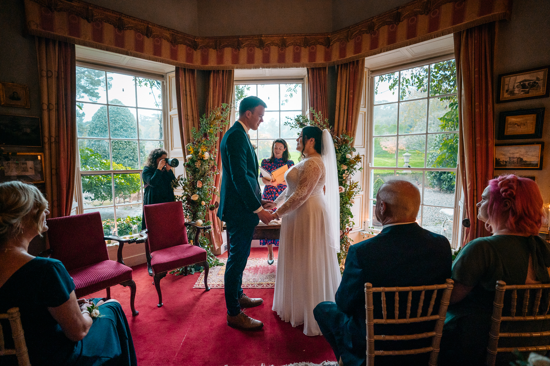 A bride and groom walking down the aisle