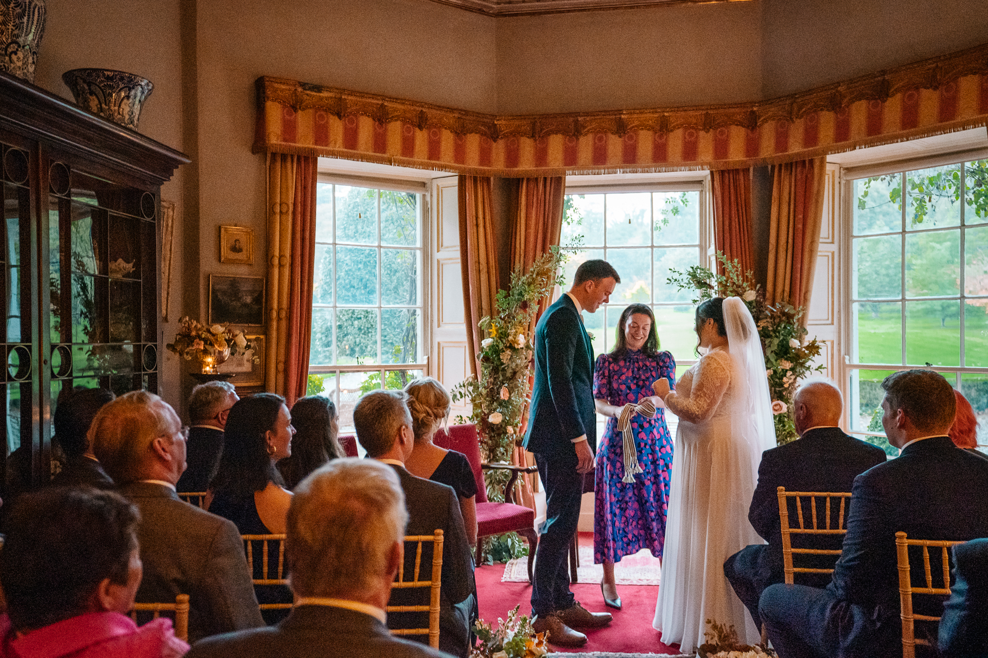 A bride and groom walking down the aisle