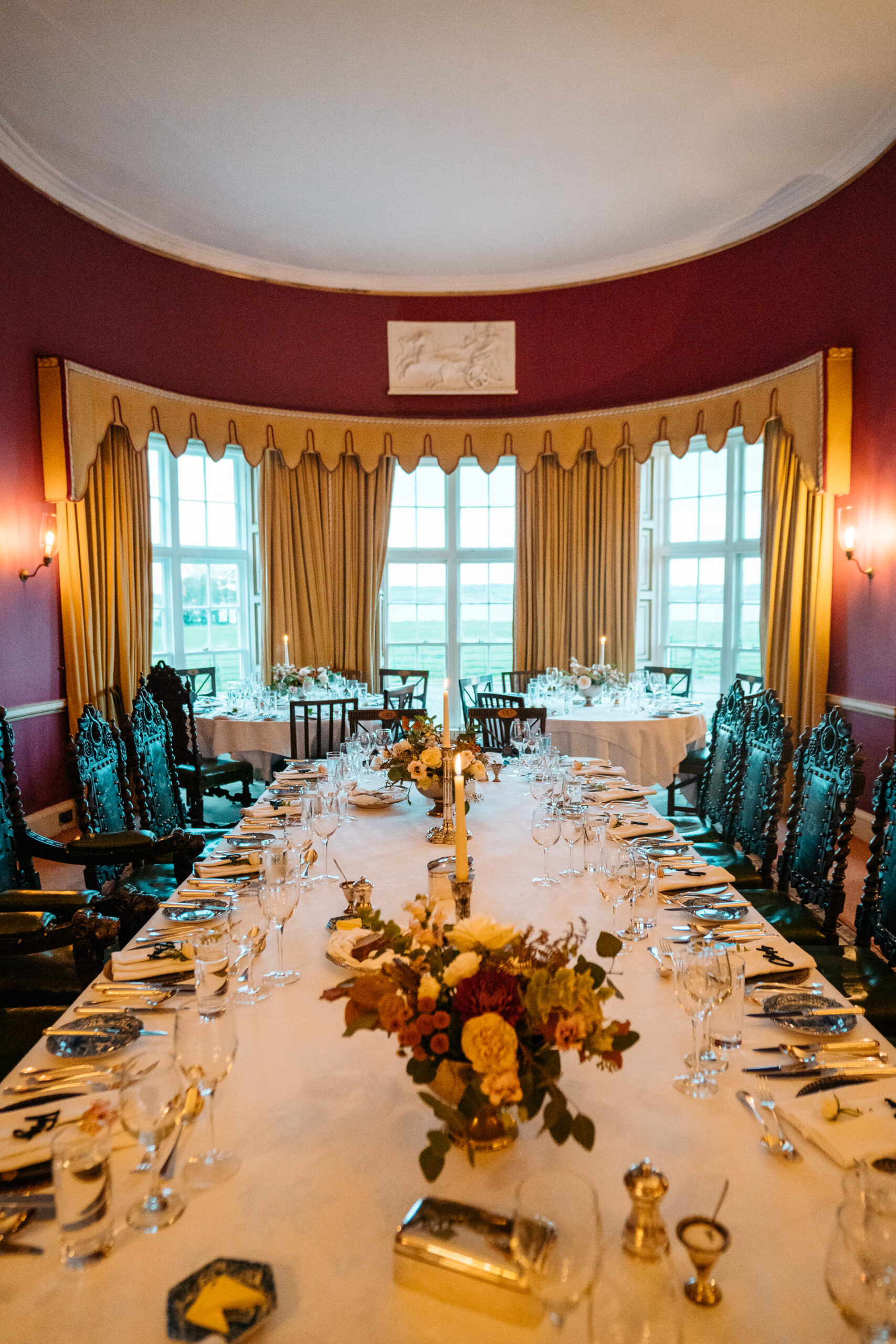 Heartfelt speeches in Glin Castle's grand dining hall, surrounded by elegantly set tables and a warm, intimate atmosphere