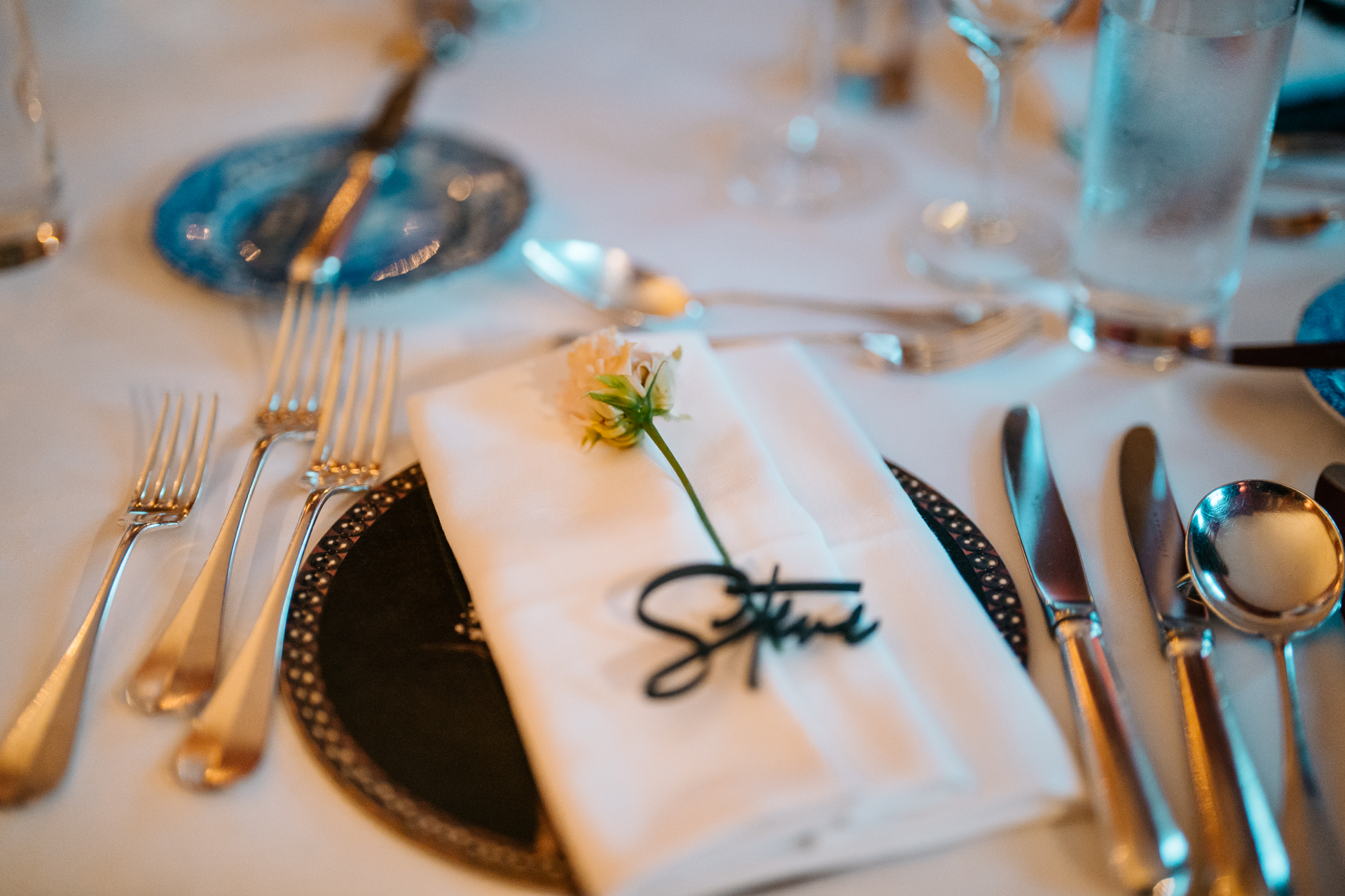 A table set with silverware and silverware