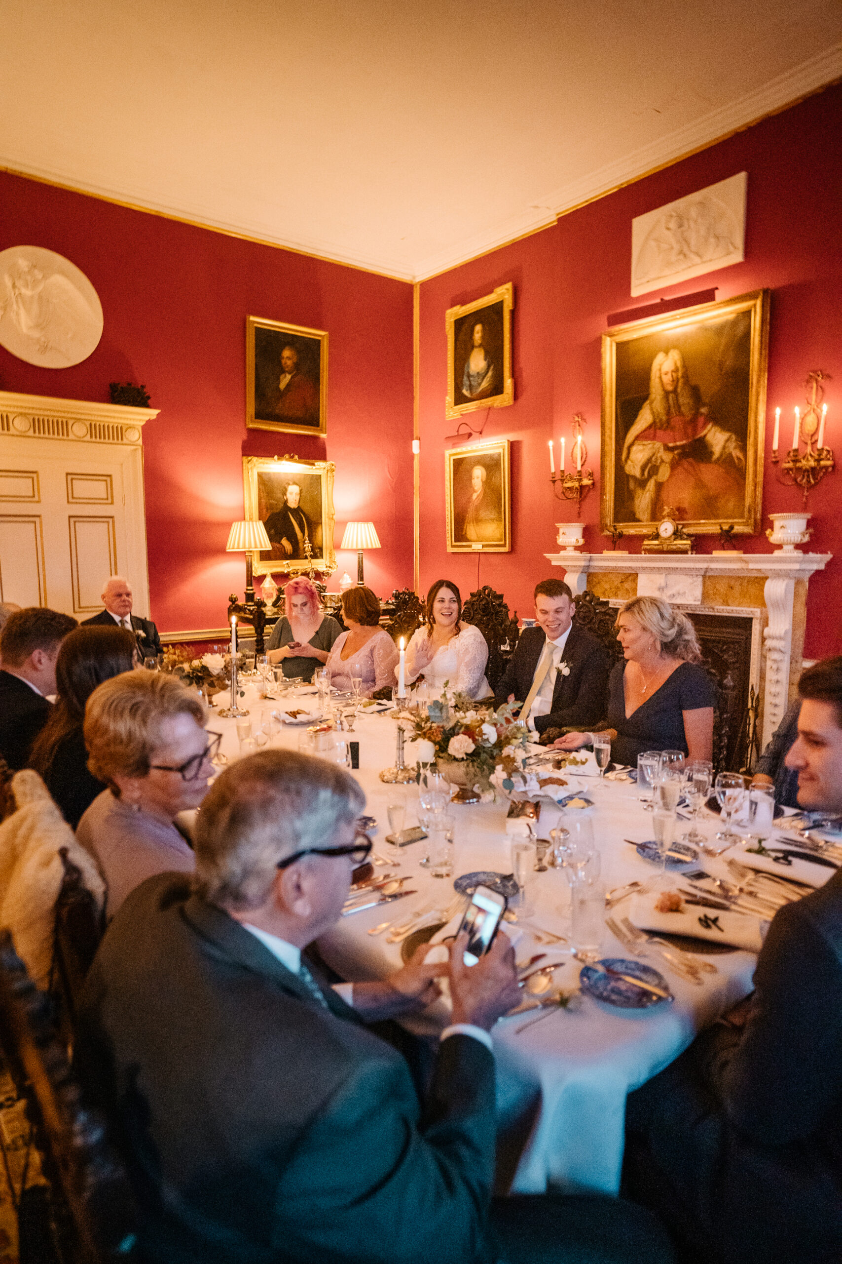 Heartfelt speeches in Glin Castle's grand dining hall, surrounded by elegantly set tables and a warm, intimate atmosphere