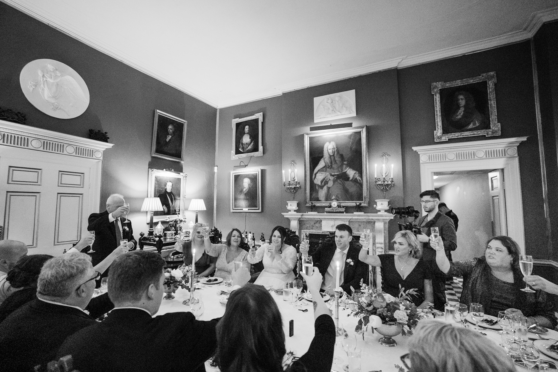 A group of people sitting around a table