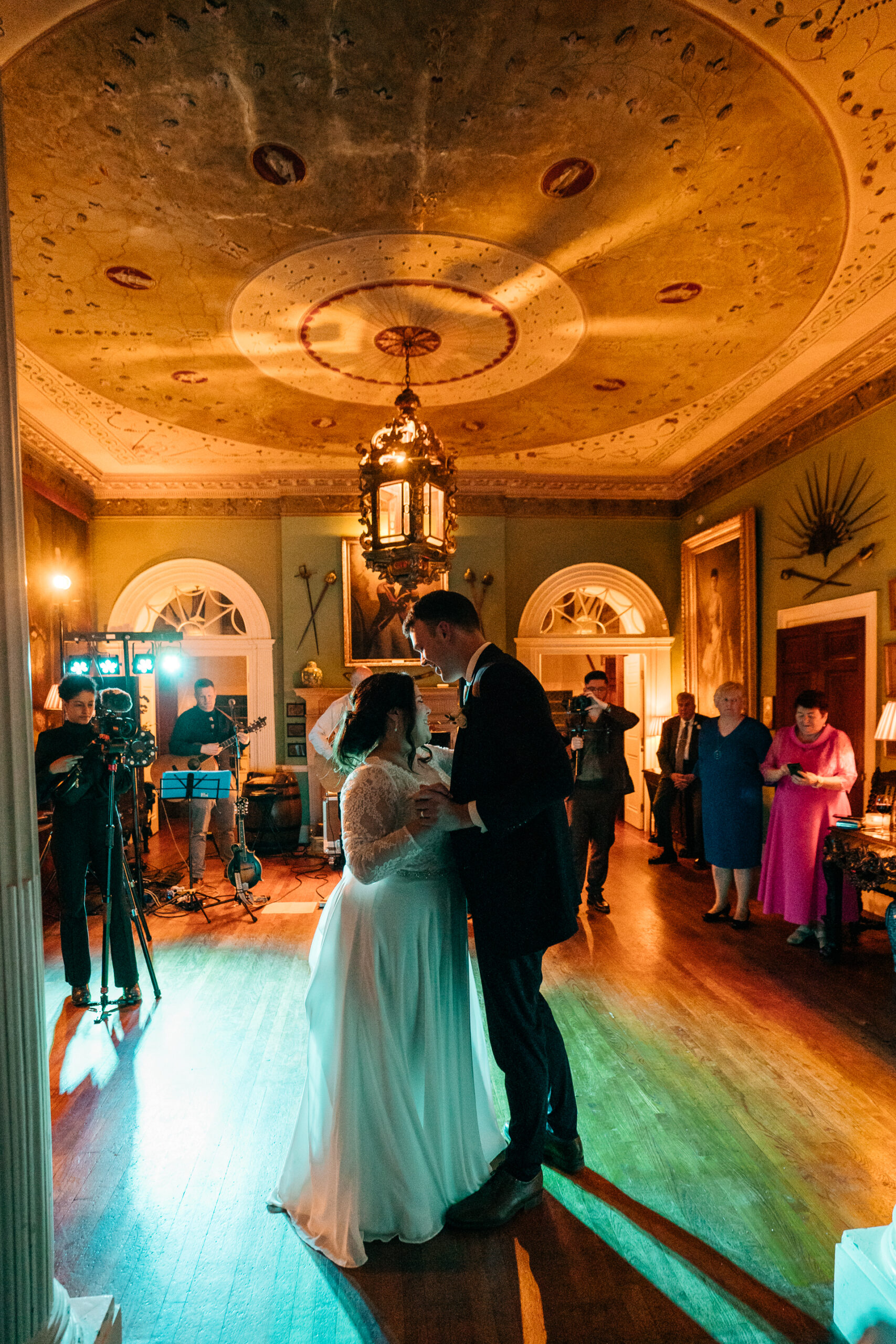 Magical first dance in Glin Castle’s grand ballroom, with warm lighting and an atmosphere of romance and celebration