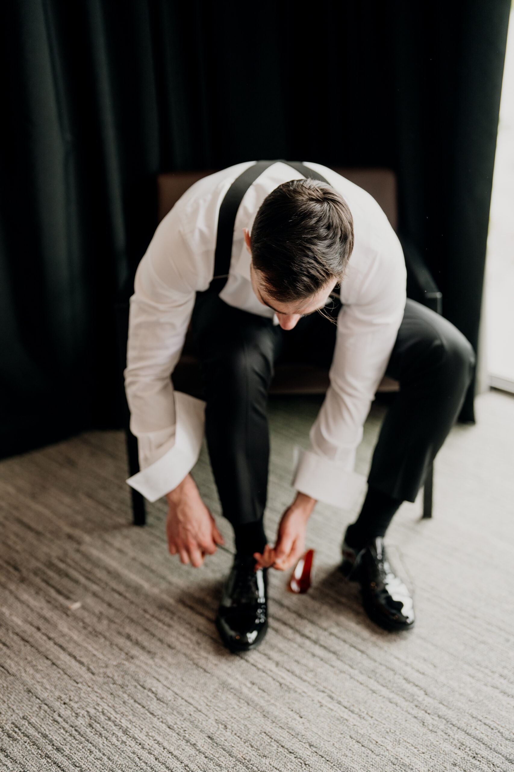 A person kneeling on the floor