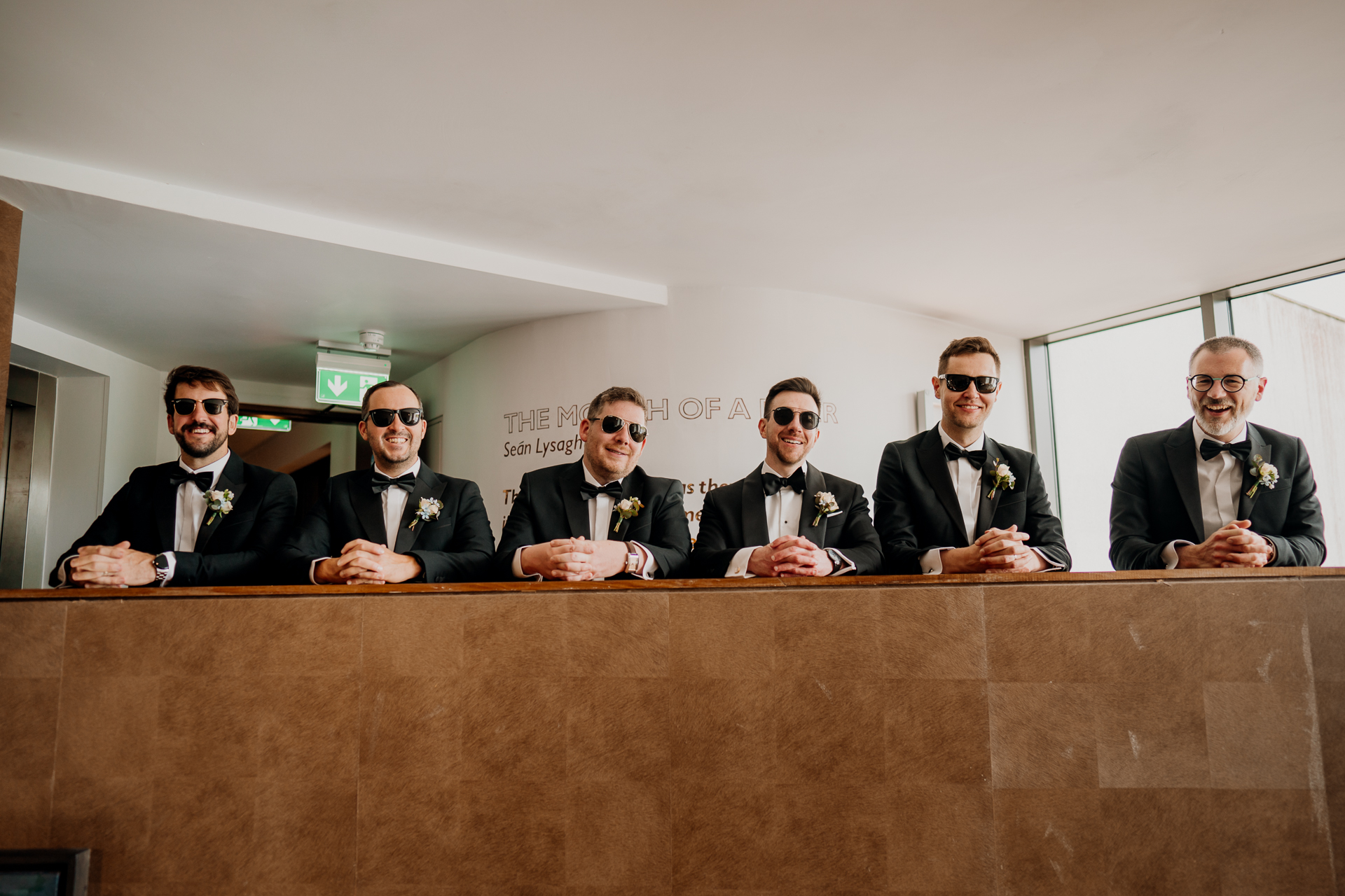 A group of men sitting at a table