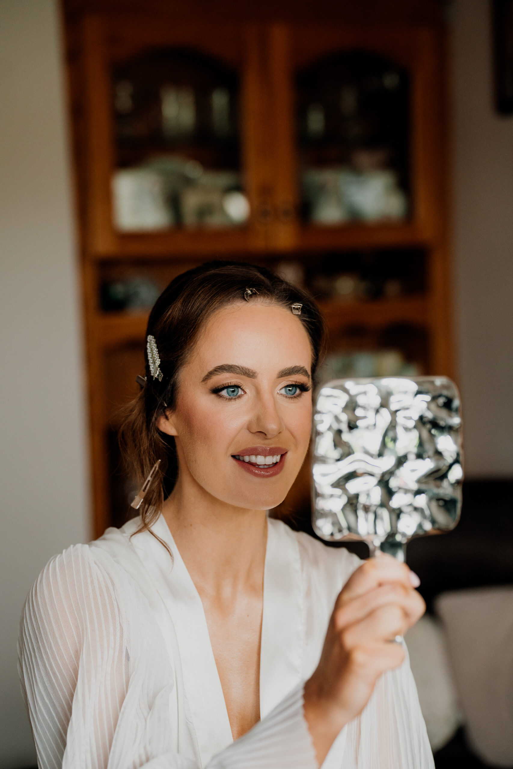 A woman holding a trophy