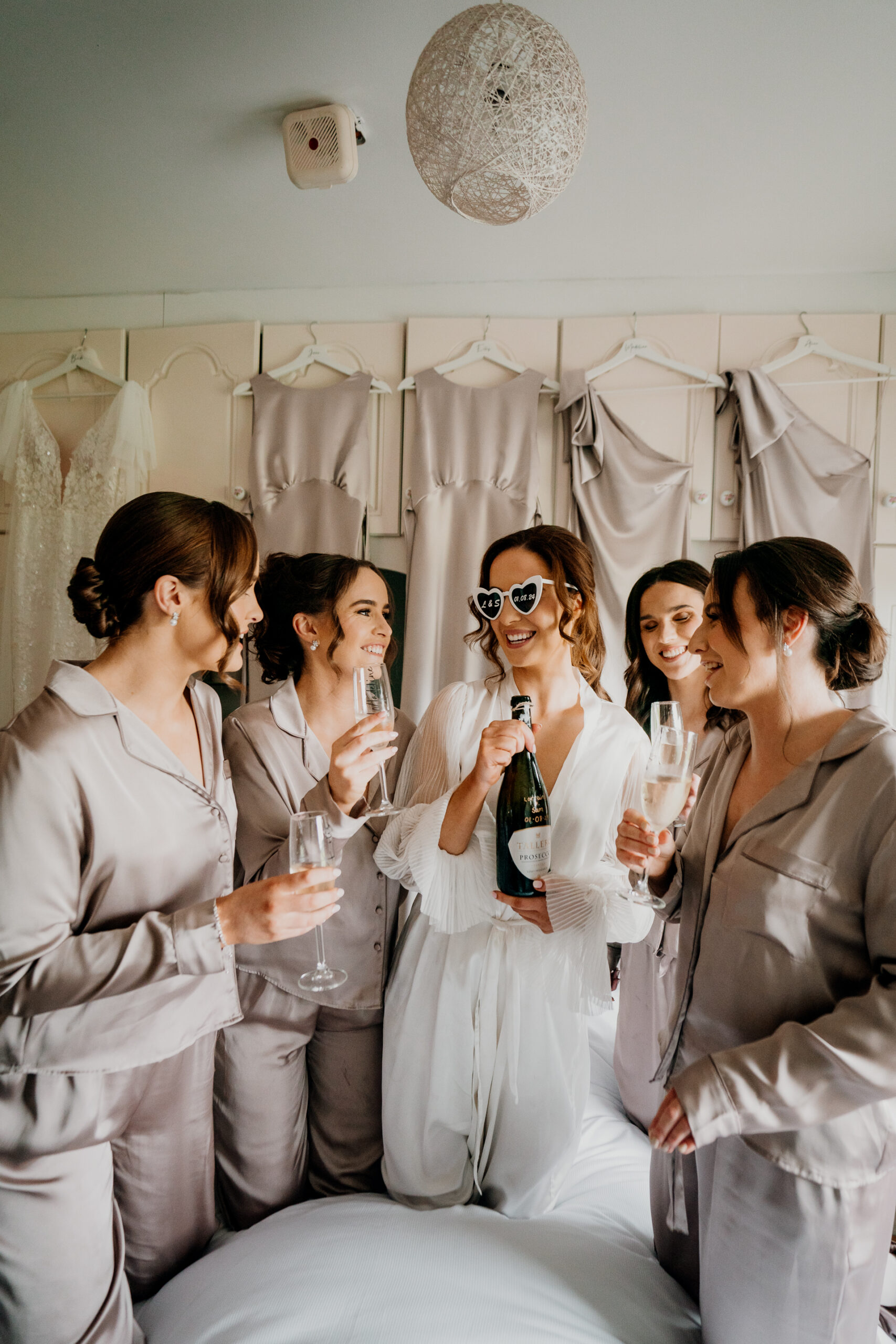 A group of women in white coats