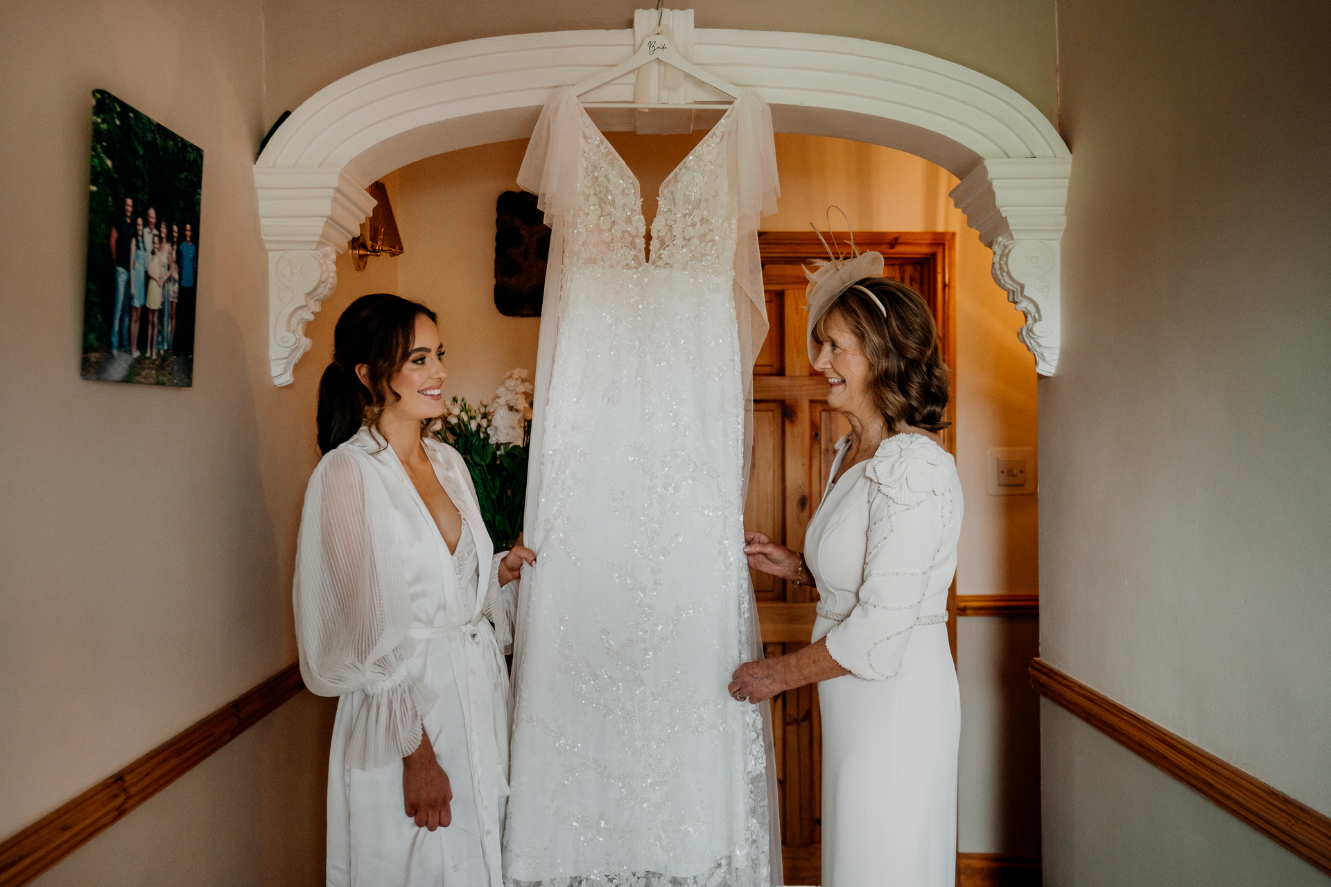 A couple of women in white dresses